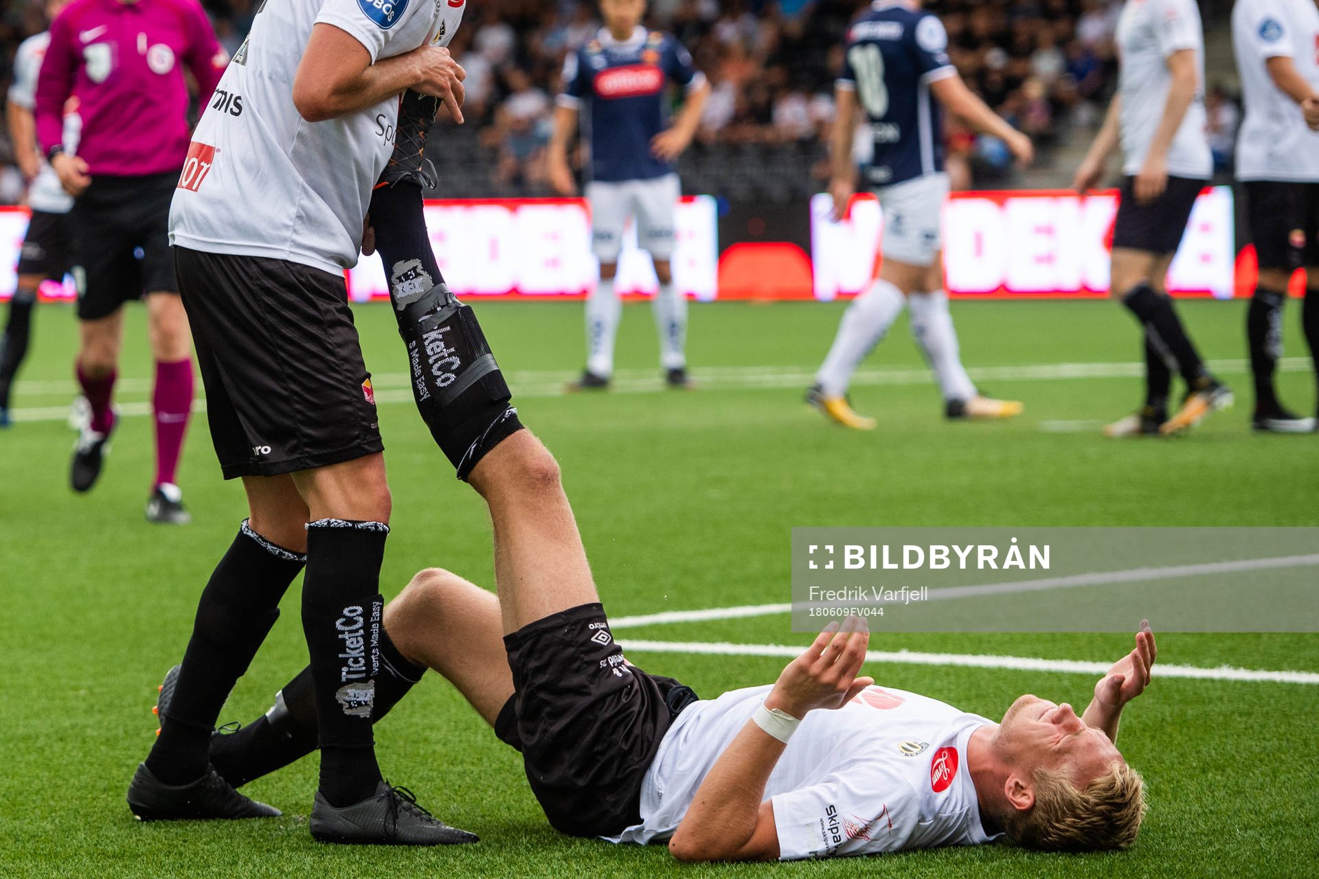 Per Magnus Steiring of Sogndal lies on the pitch due to injury during the OBOS-ligaen match between Sogndal and Viking on June 9, 2018 in Sogndal.