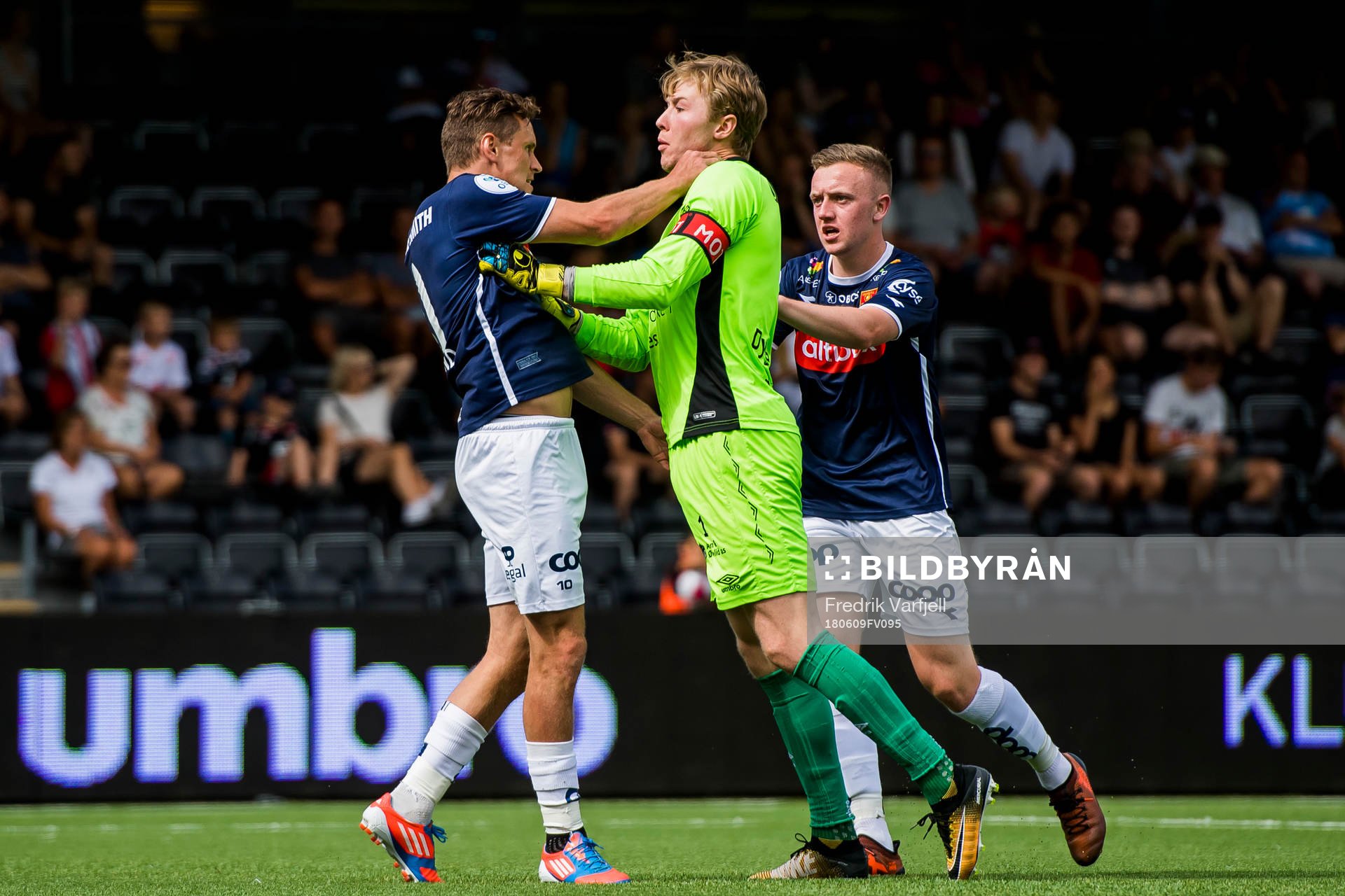 Tommy Høiland of Viking and Goalkeeper Mathias Dyngeland