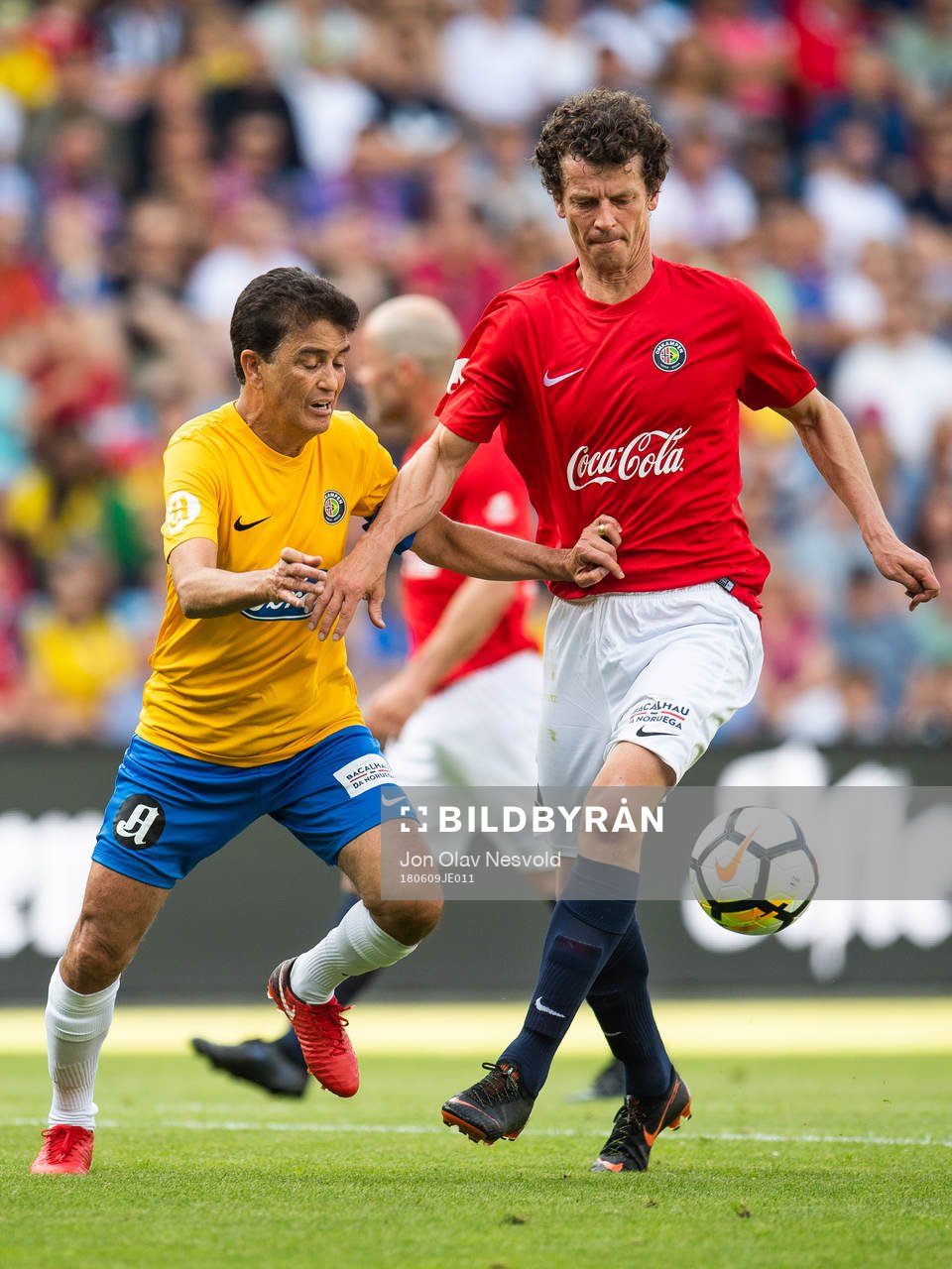 Bebeto of Brazil and <Dan Eggen of Norway competes for the