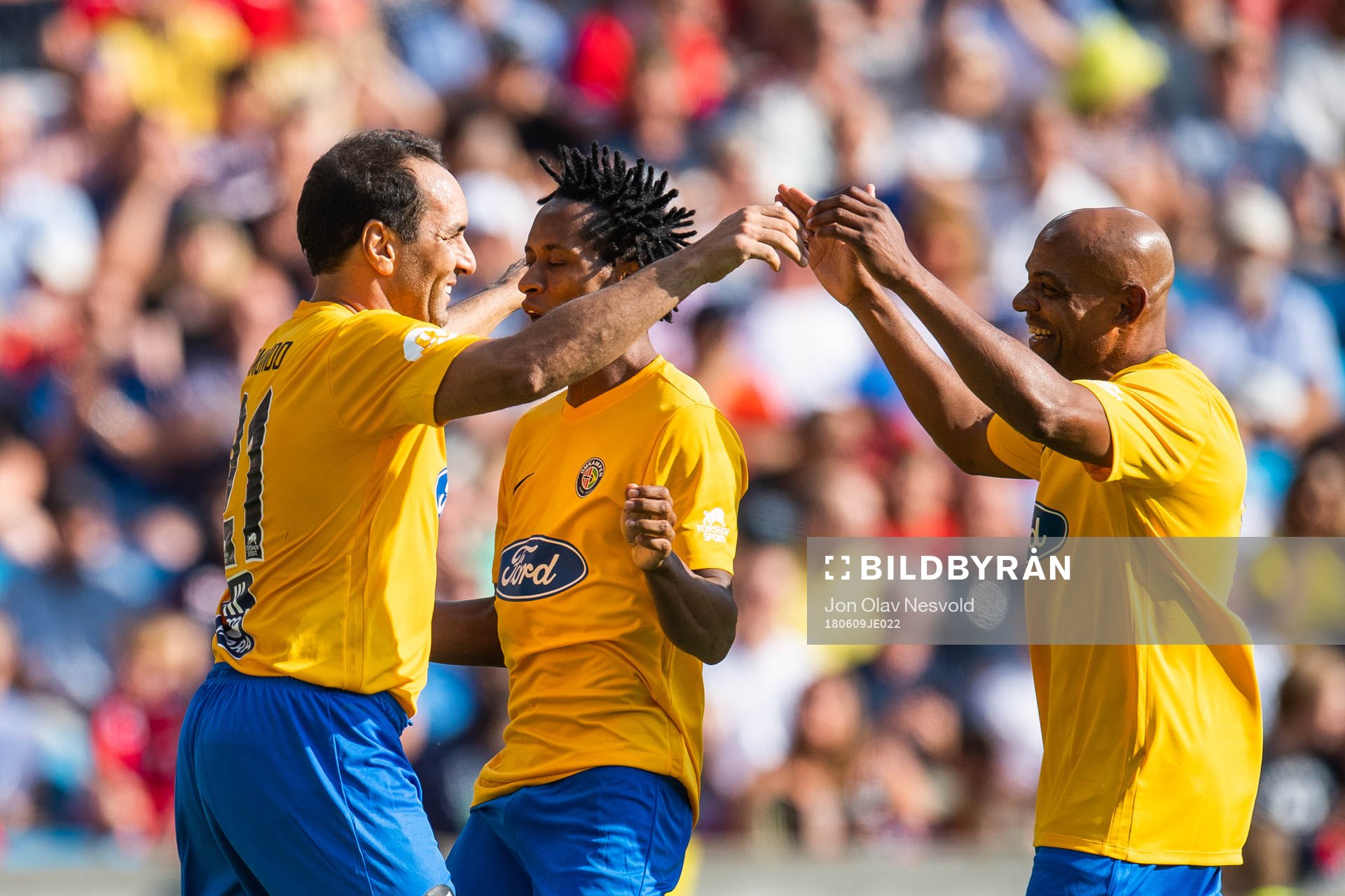 Edmundo of Brazil celebrates with team mates