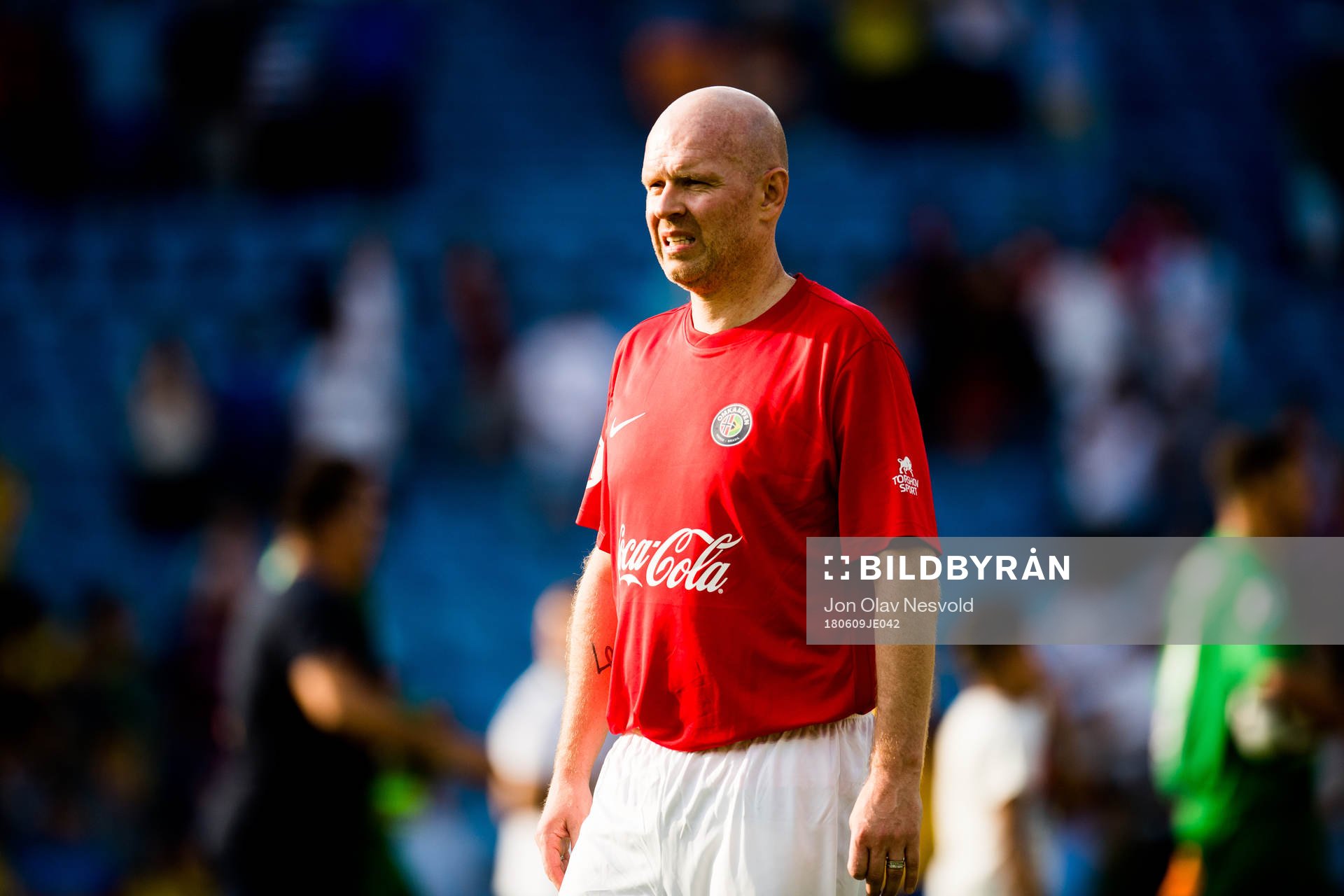 Henning Berg of Norway looks dejected