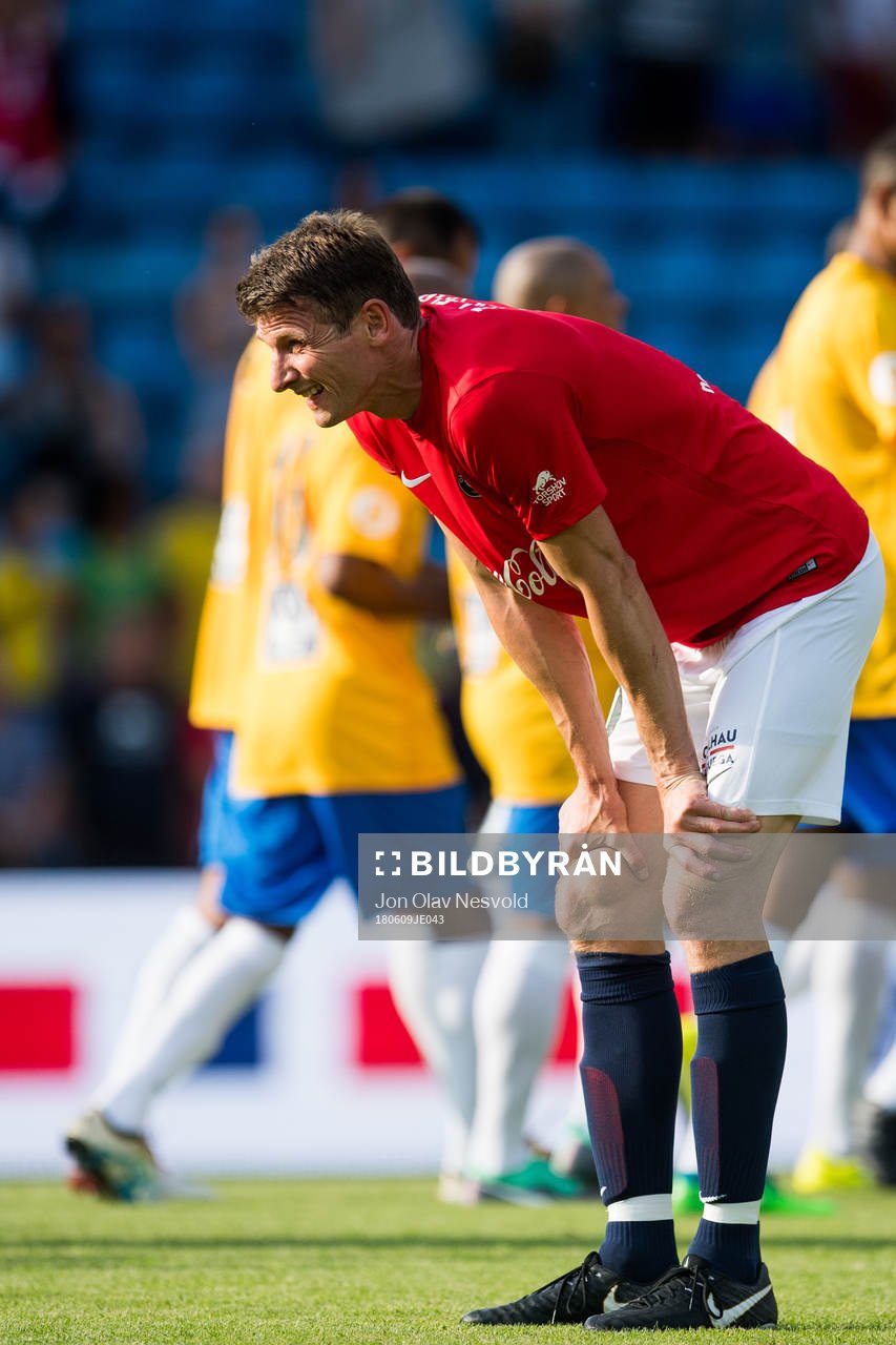 Tore André Flo of Norway looks dejected