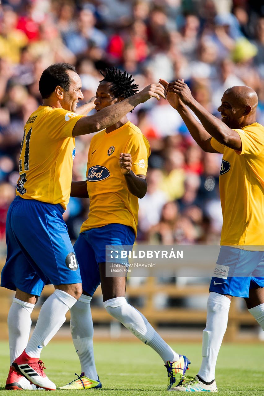 Edmundo of Brazil celebrates the 0-1 goal with teammates
