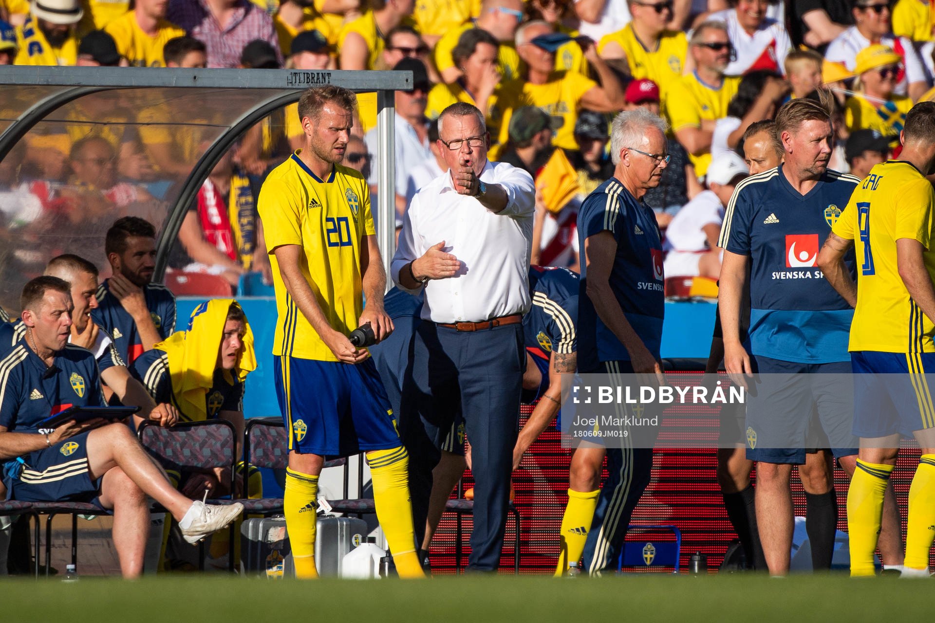 Ola Toivonen of Sweden is given instructions by Janne