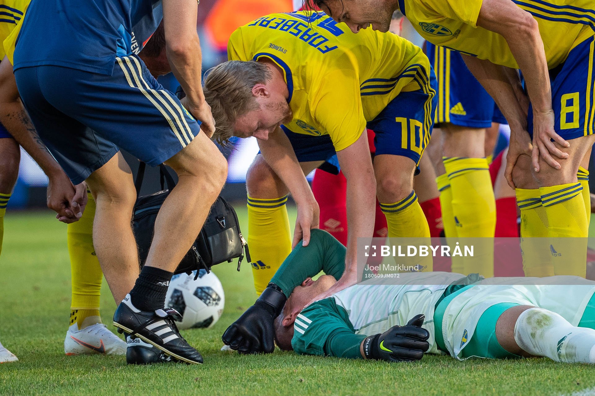 Goalkeeper Robin Olsen of Sweden lies down