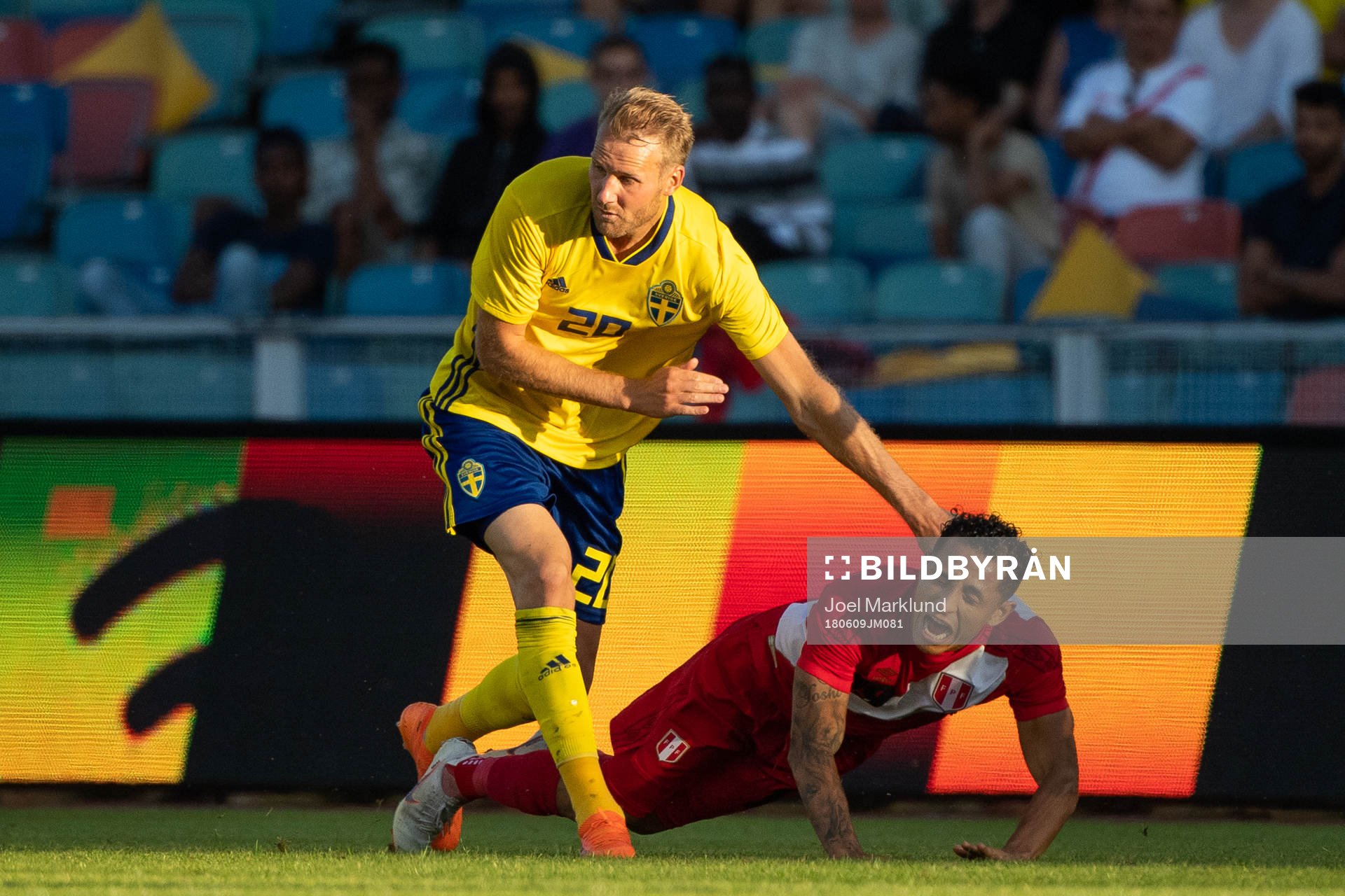 Ola Toivonen of Sweden tackles Yoshimar Yotun of Peru during the international friendly football match between Sweden and Peru on June 9, 2017 in Gothenburg.