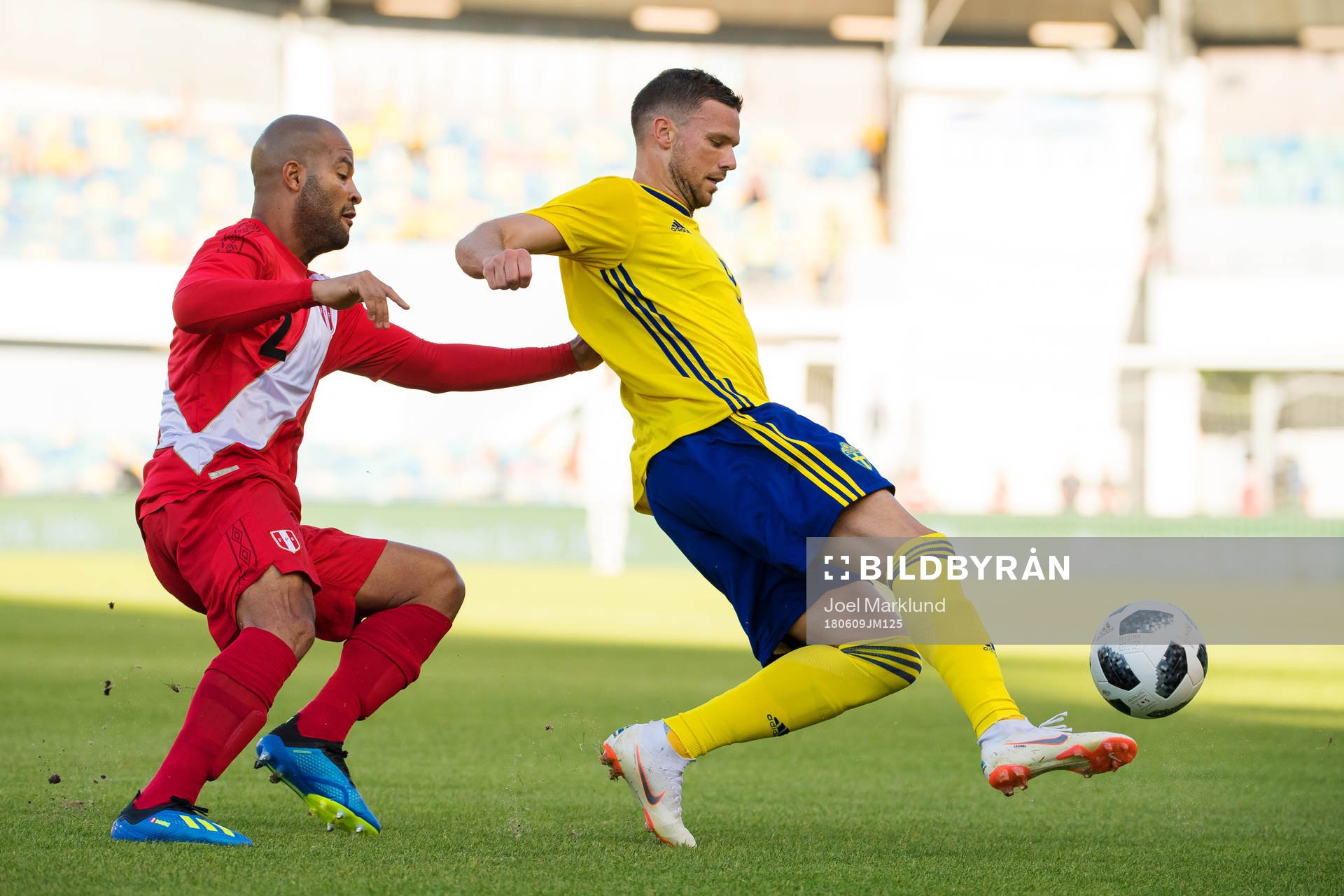 Albert Rodriguez of Peru and Marcus Berg of Sweden
