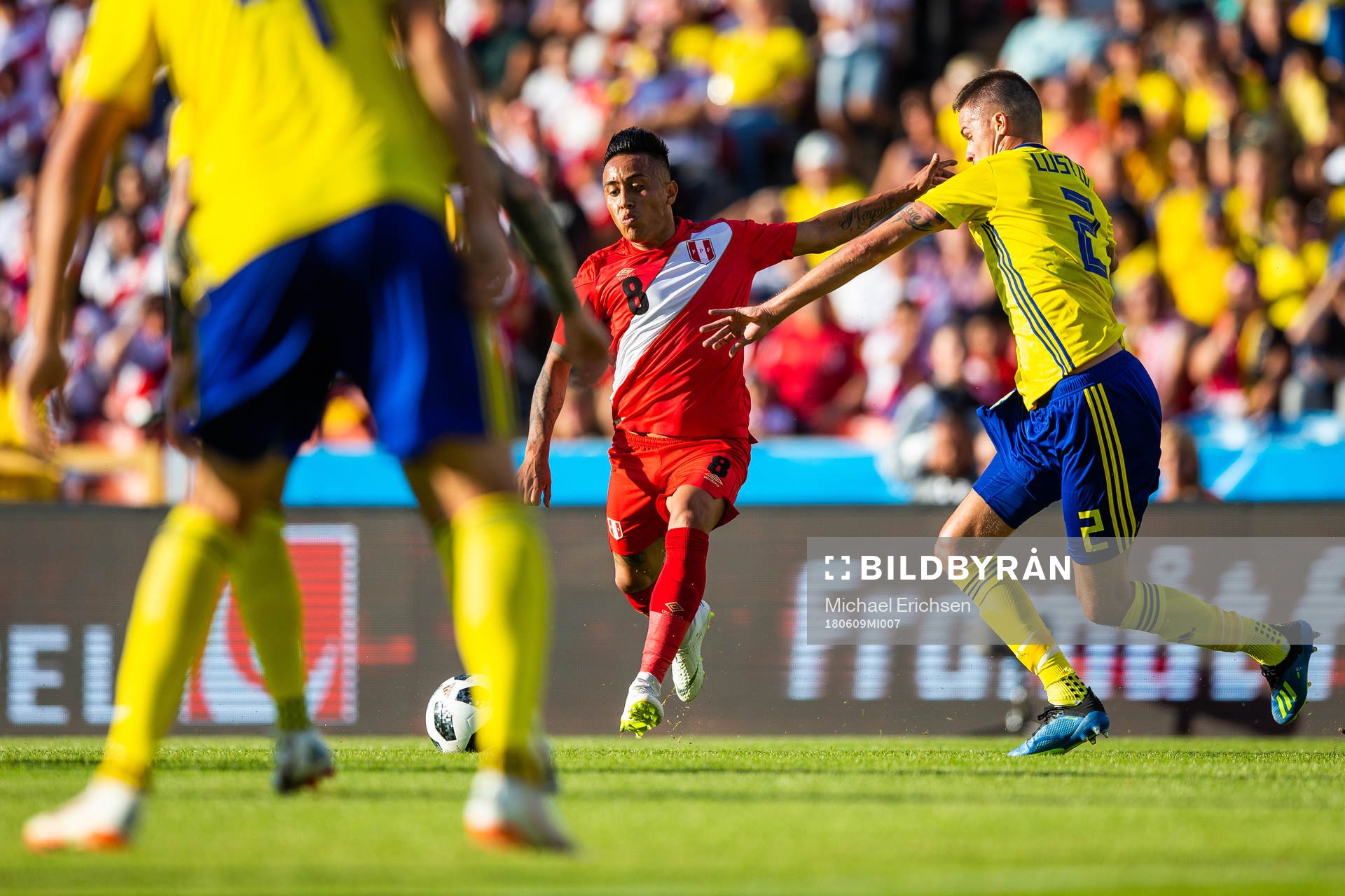 of PeruChristian Cueva of Peru competes for the ball with