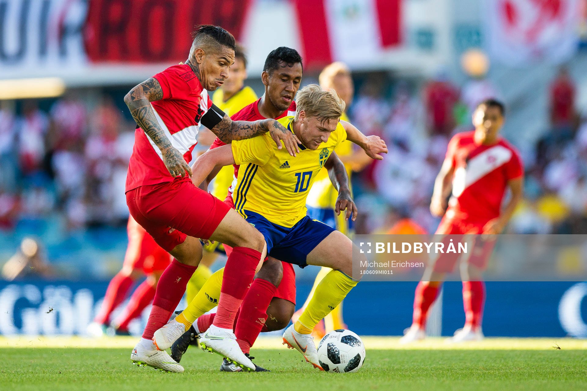 Emil Forsberg of Sweden competes for the ball with Paolo