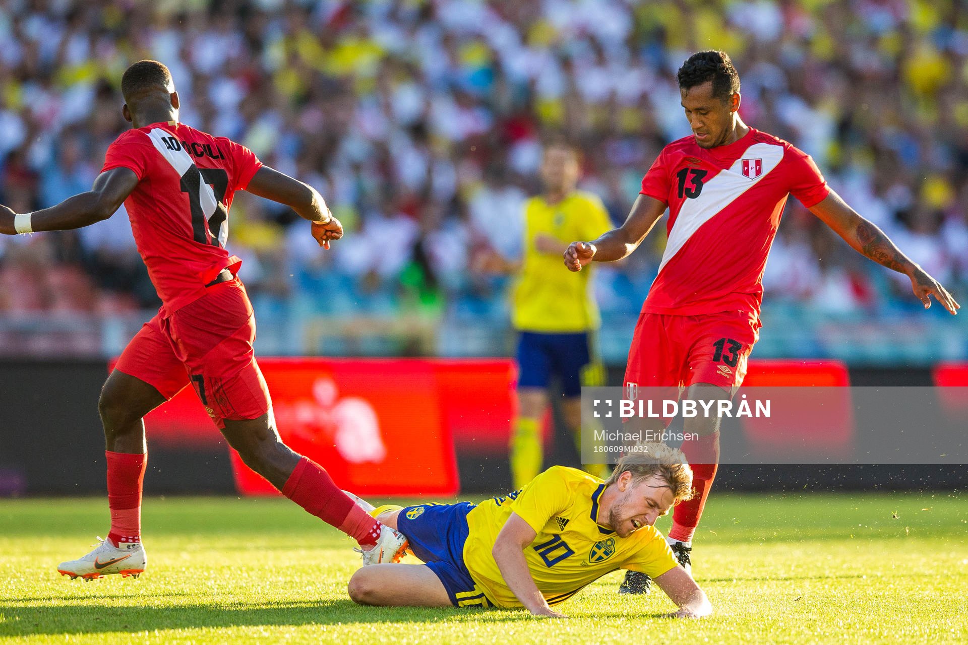 Emil Forsberg of Sweden falls in a duell with Luis
