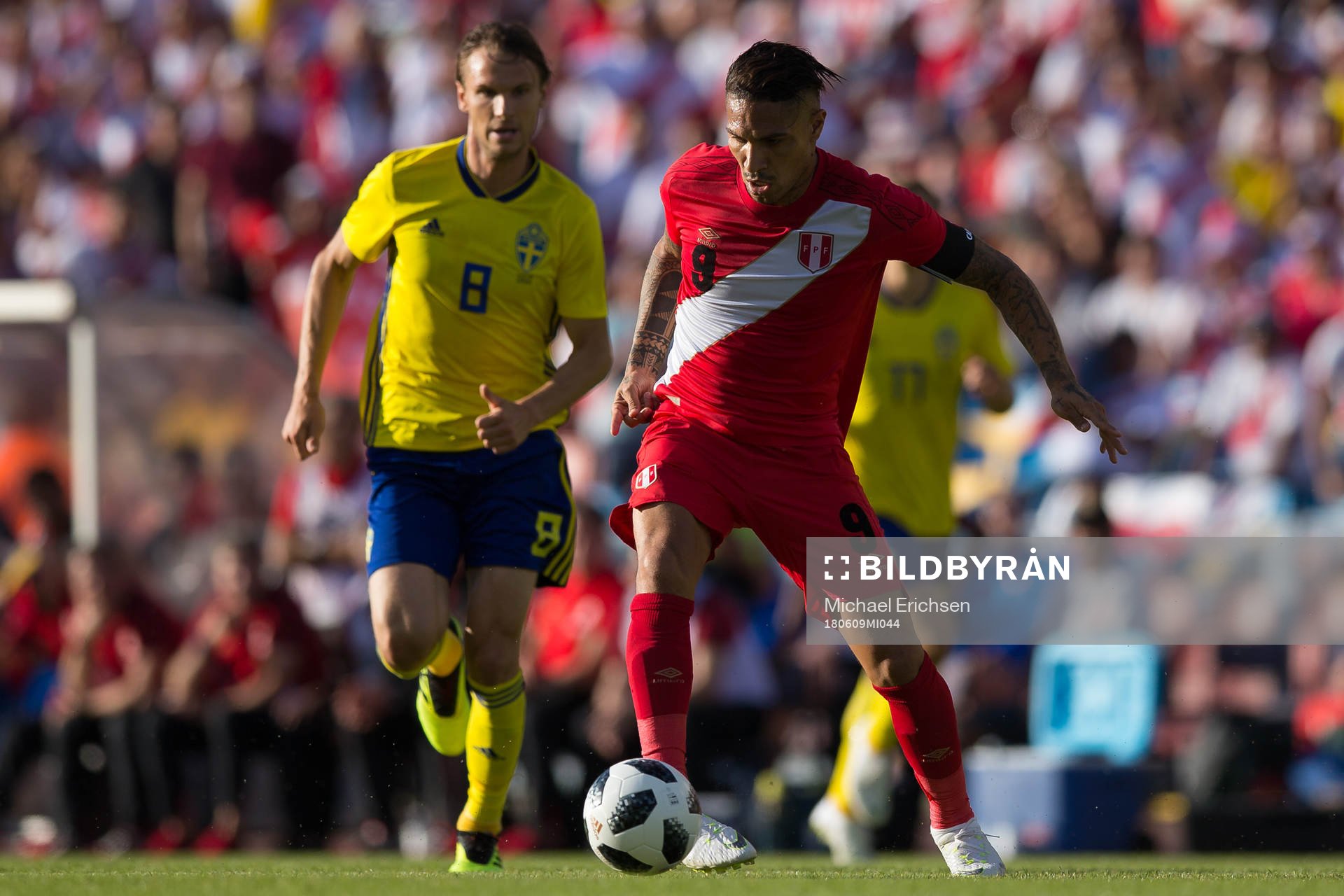 Paolo Guerrero of Peru and Albin Ekdal of Sweden