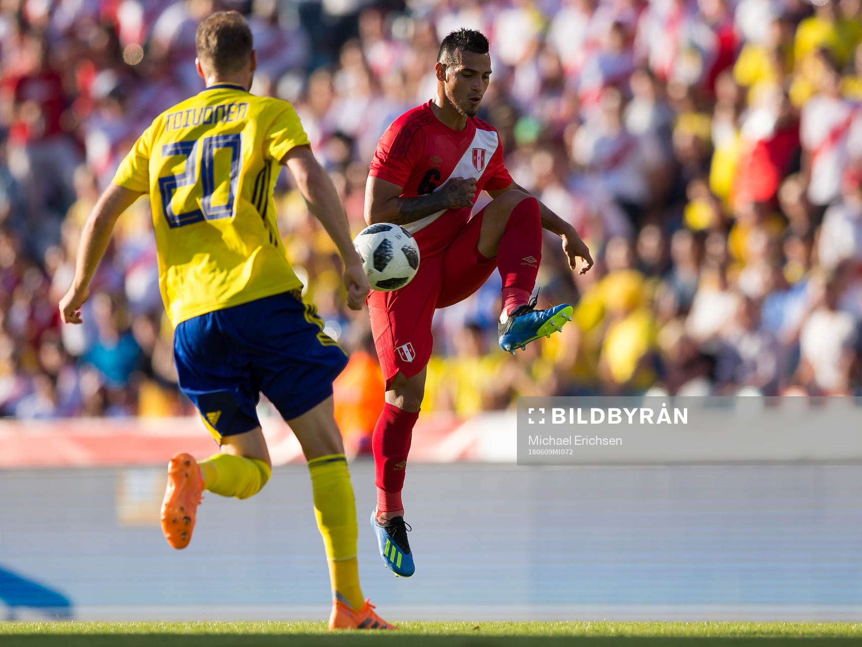 Ola Toivonen of Sweden and Miguel Trauco of Peru