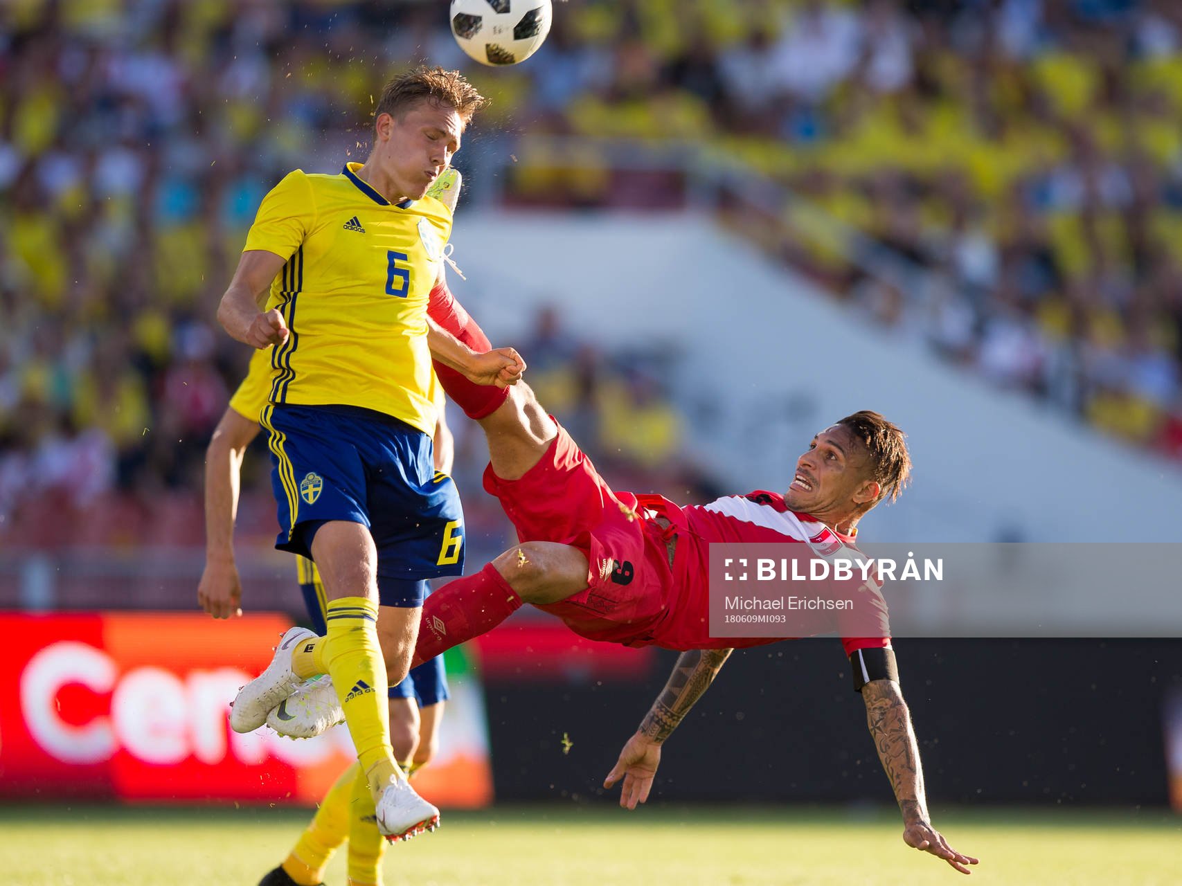 Ludwig Augustinsson of Sweden and Paolo Guerrero of Peru