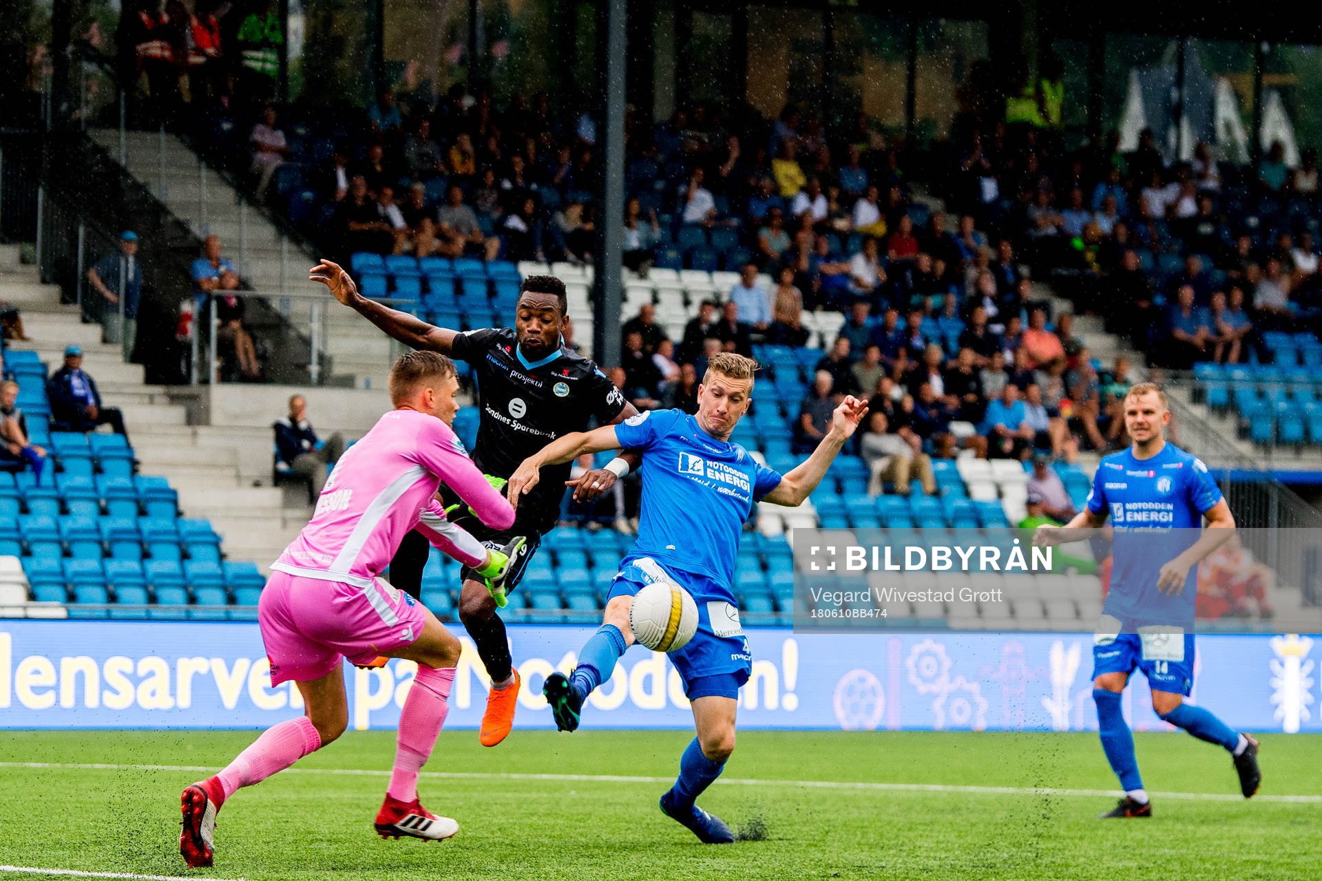 Goalkeeper Nils Jonathan Johansson of Notodden, Kachi of Sandnes Ulf and Martin Strange of Notodden during the OBOS-ligaen match between Notodden and Sandnes Ulf on June 10, 2018 in Notodden.