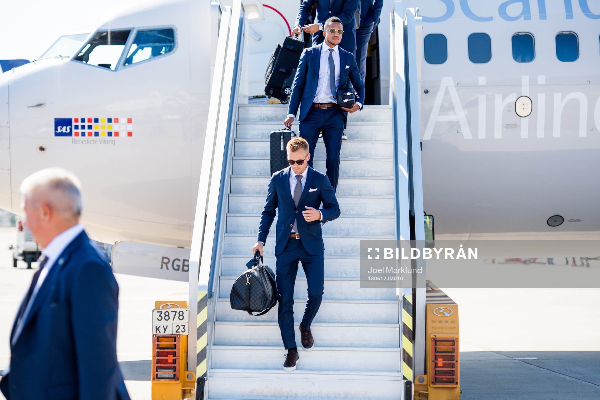 Sebastian Larsson and Martin Olsson of Sweden disembark the