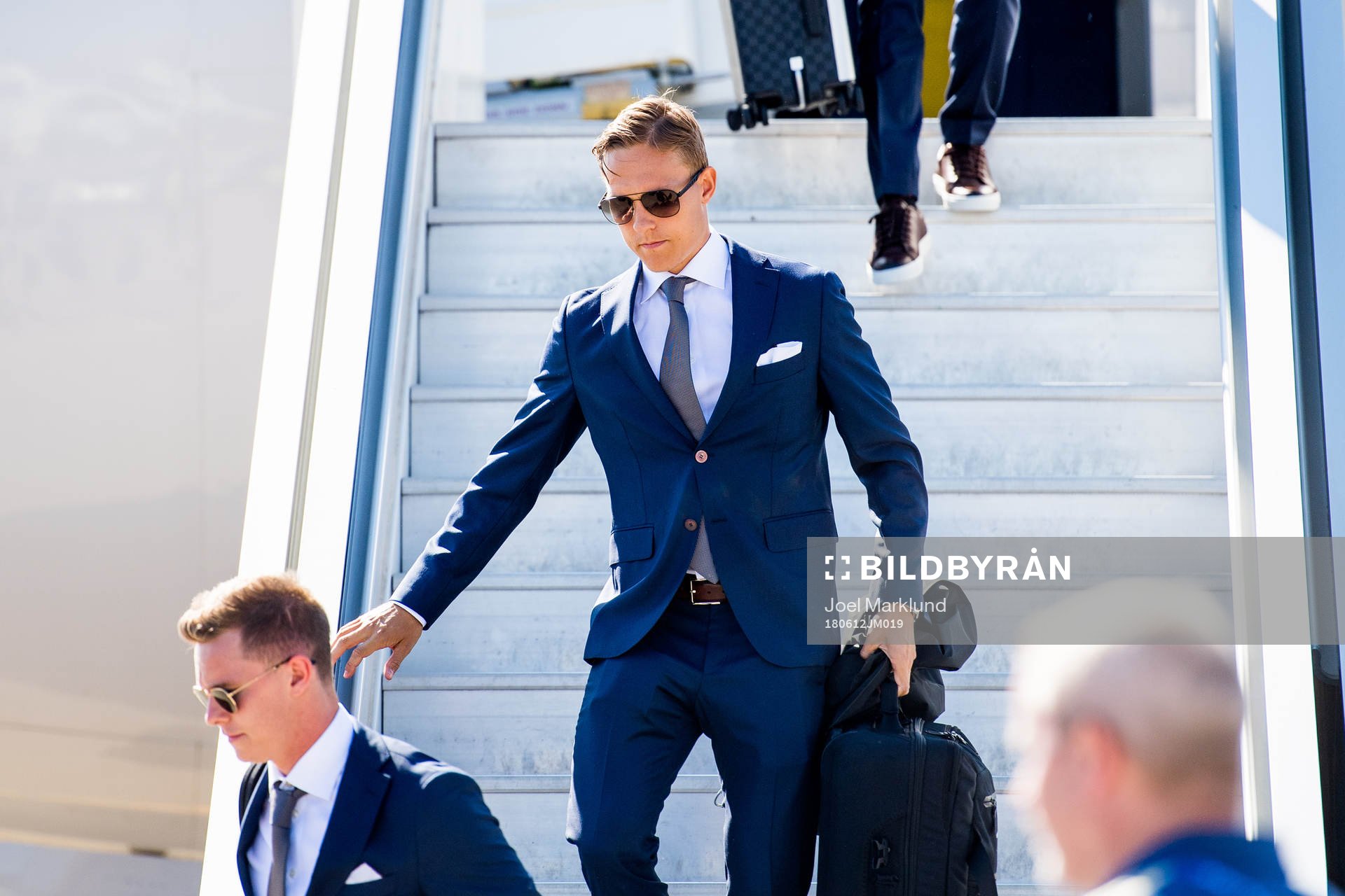 Ludwig Augustinsson of Sweden disembark the plane when the