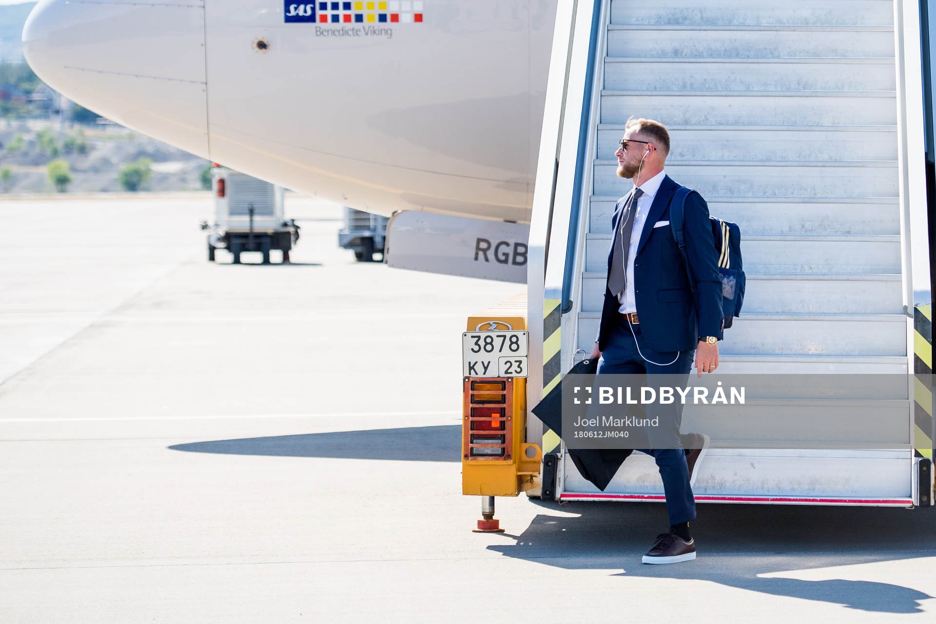 John Guidetti of Sweden disembarks the plane when the
