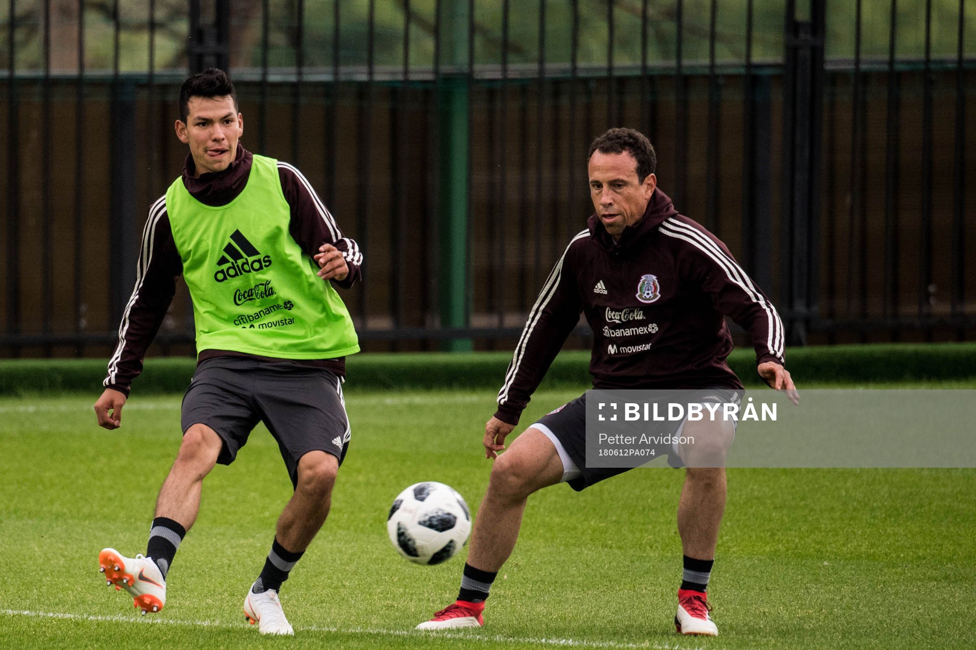 Hirving Lozano (left)  of Mexico