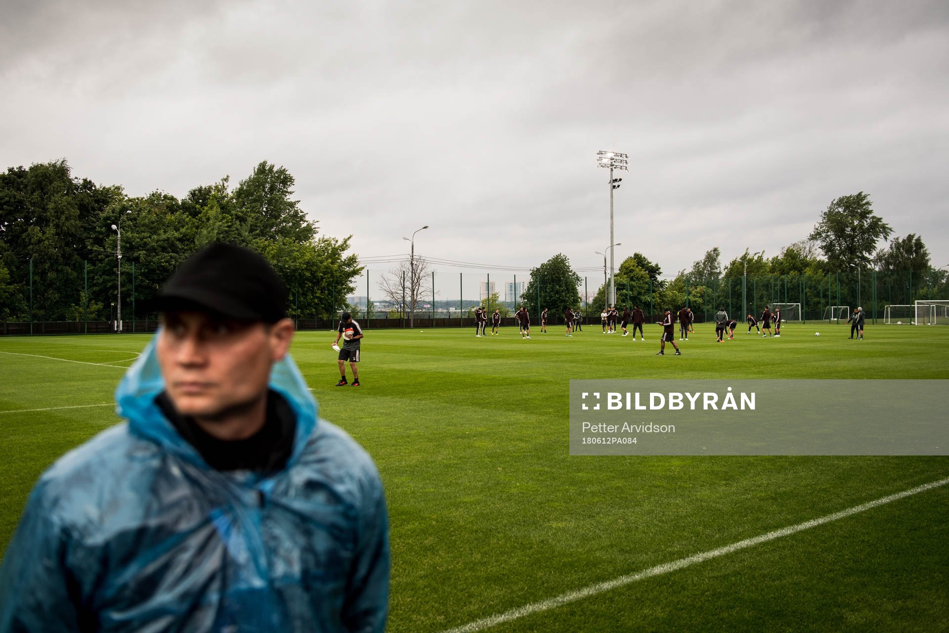 A police standing guard in front of Mexico practice session