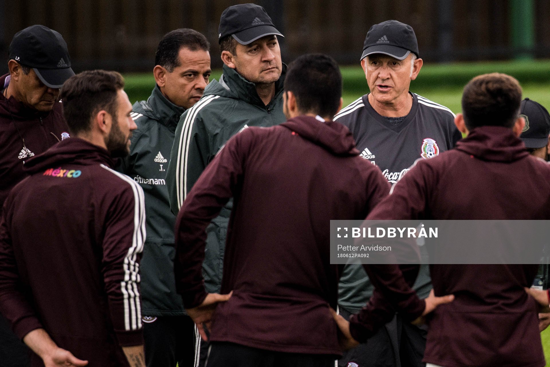 Juan Carlos Osorio, coach of Mexico talks to the players