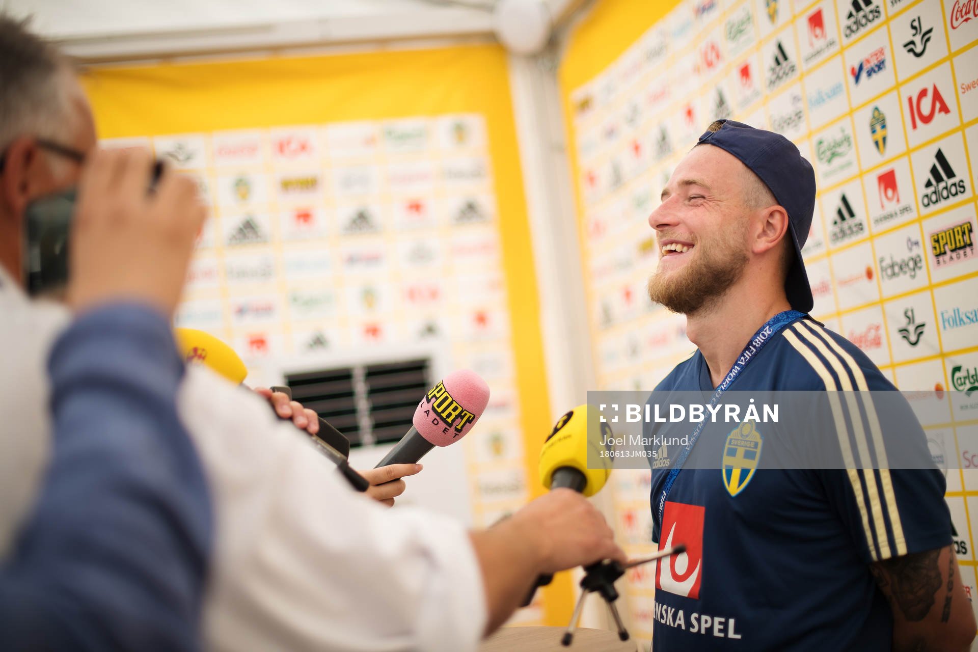 John Guidetti of the Swedish national football team laughs