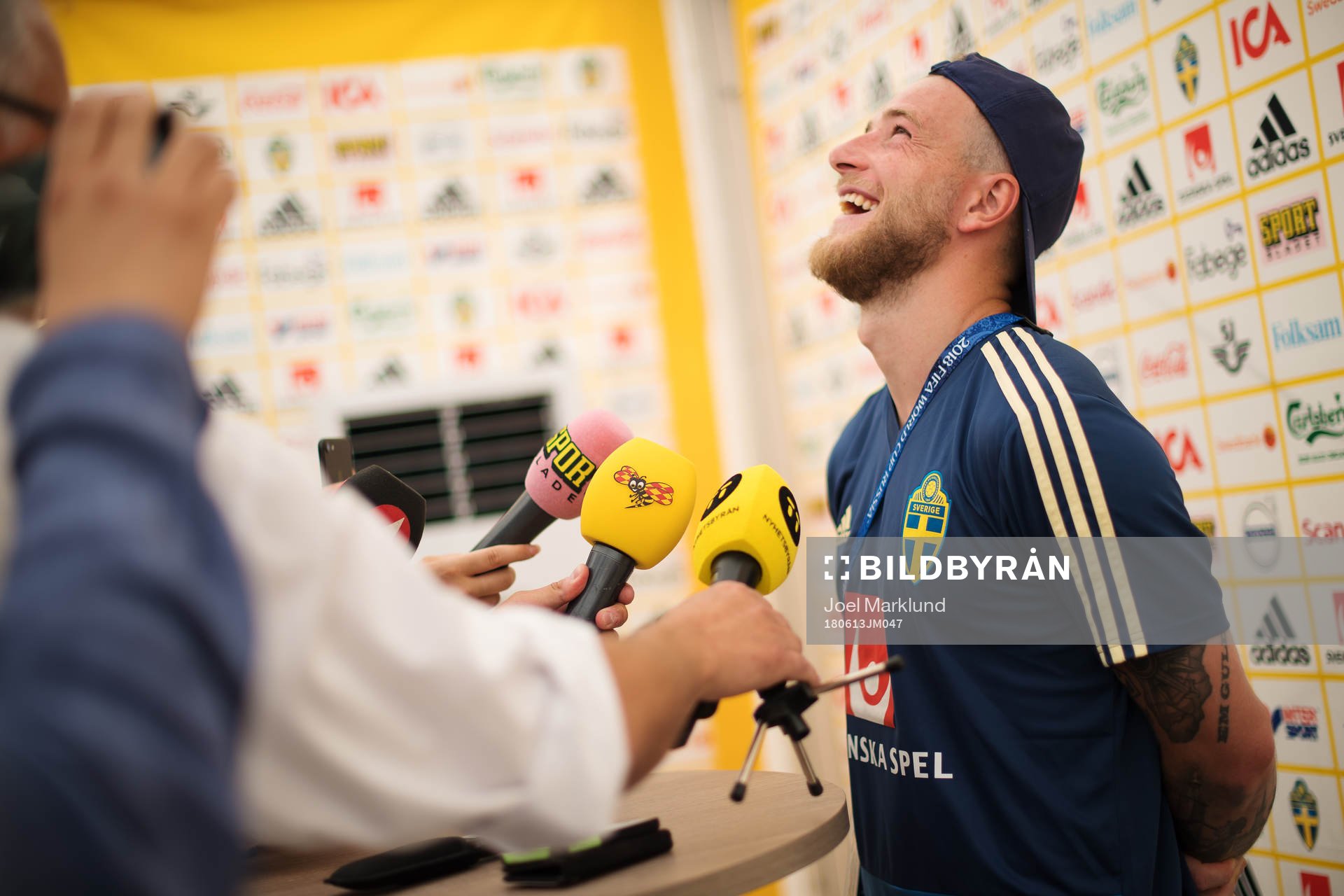 John Guidetti of the Swedish national football team laughs
