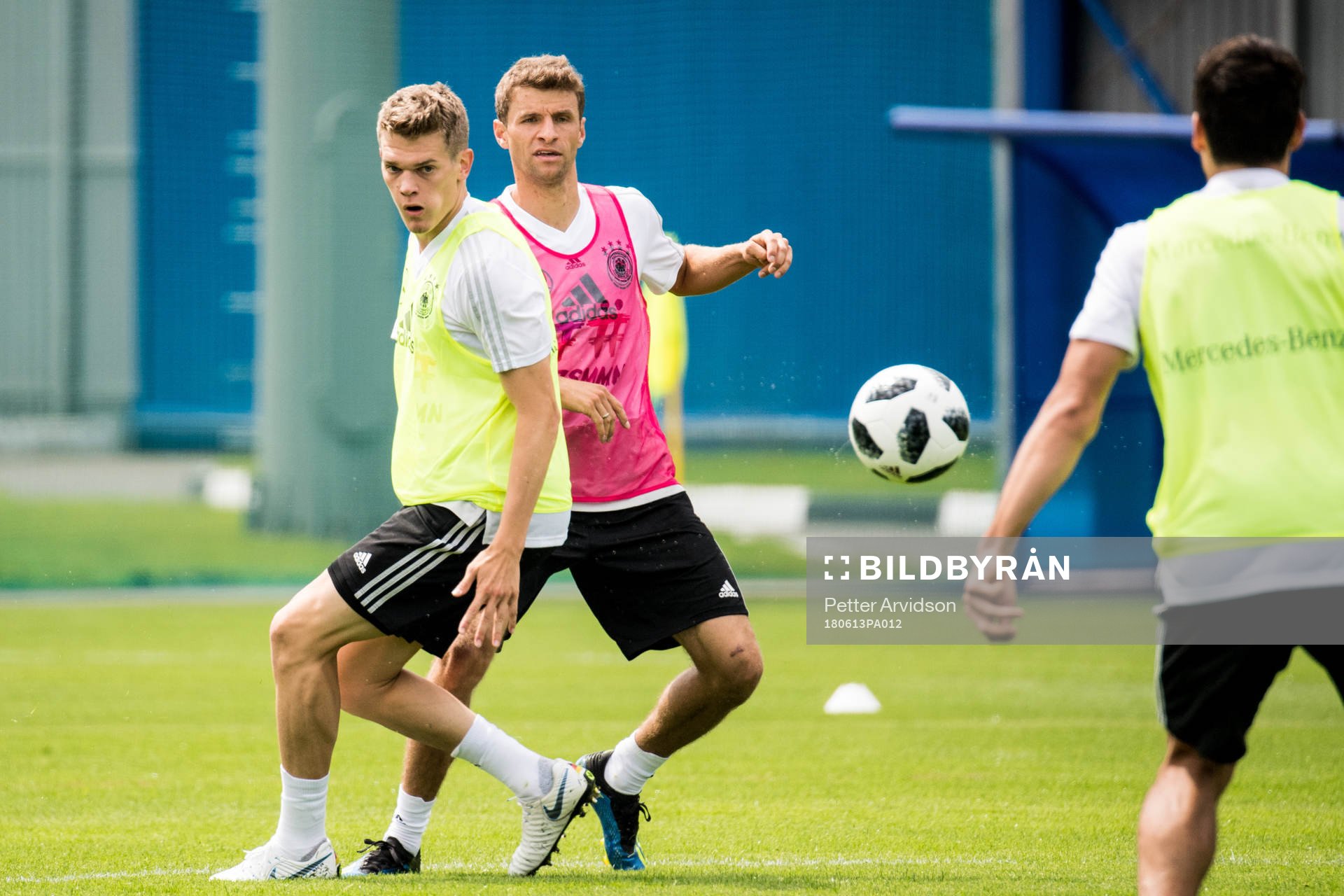Matthias Ginter and Thomas Muller of Germany