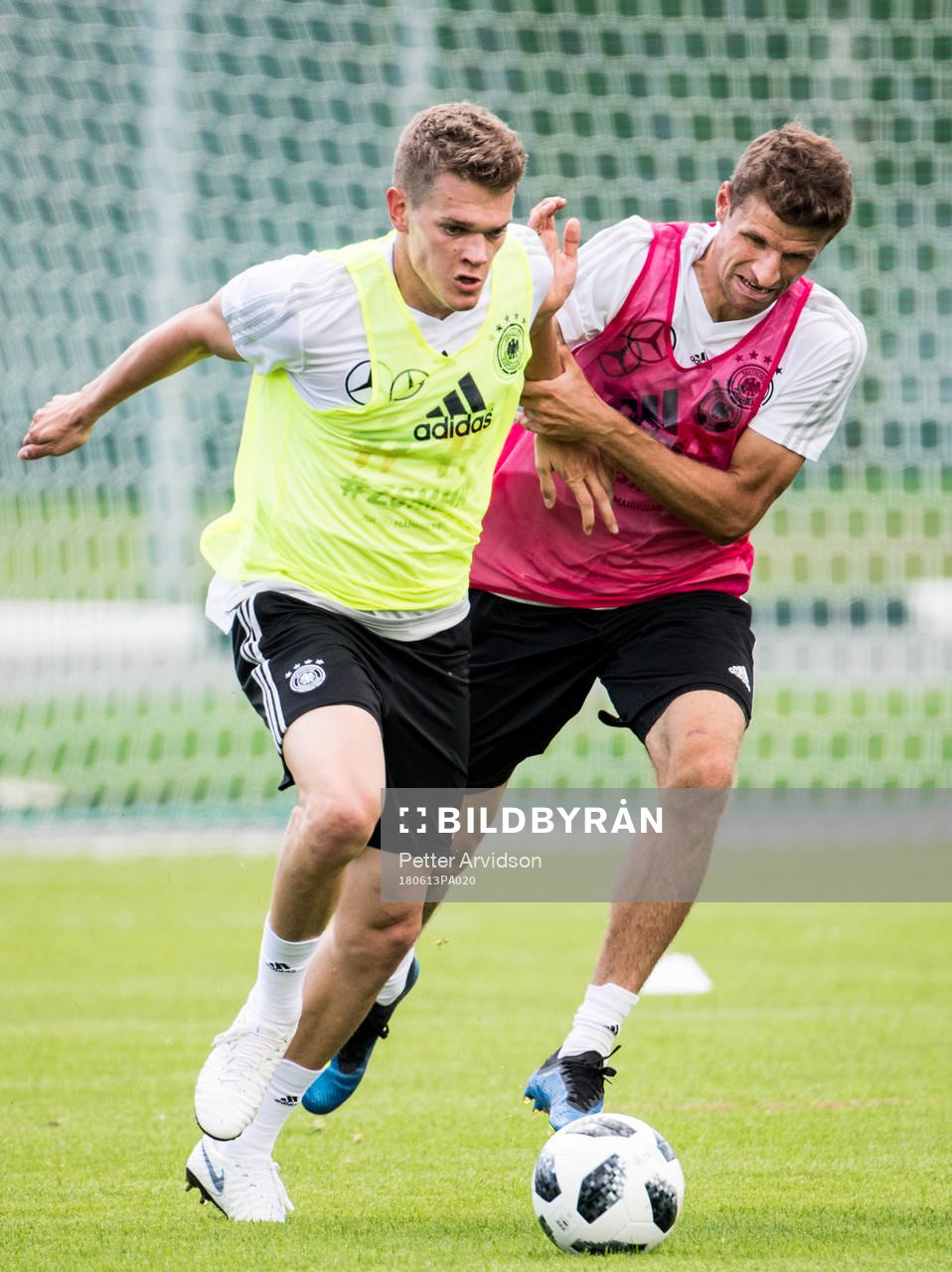 Matthias Ginter and Thomas Muller of Germany
