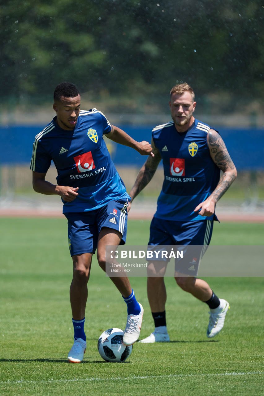 Martin Olsson and John Guidetti of the Swedish national