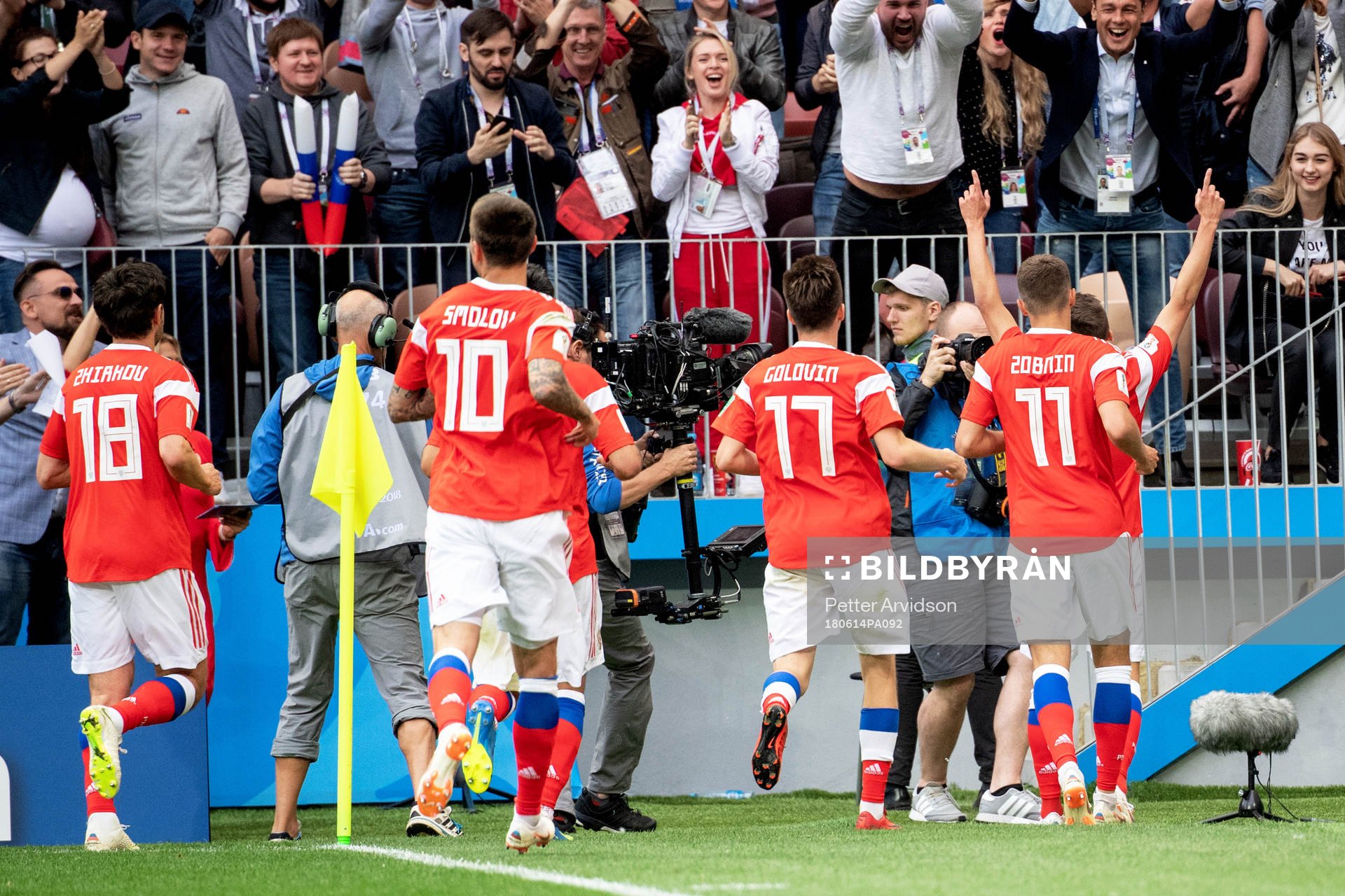 Denis Cheryshev of Russia celebrates with his teammates after scoring 2-0 during the FIFA World Cup group stage match between Russia and Saudi Arabia on June 14, 2018 in Moscow.