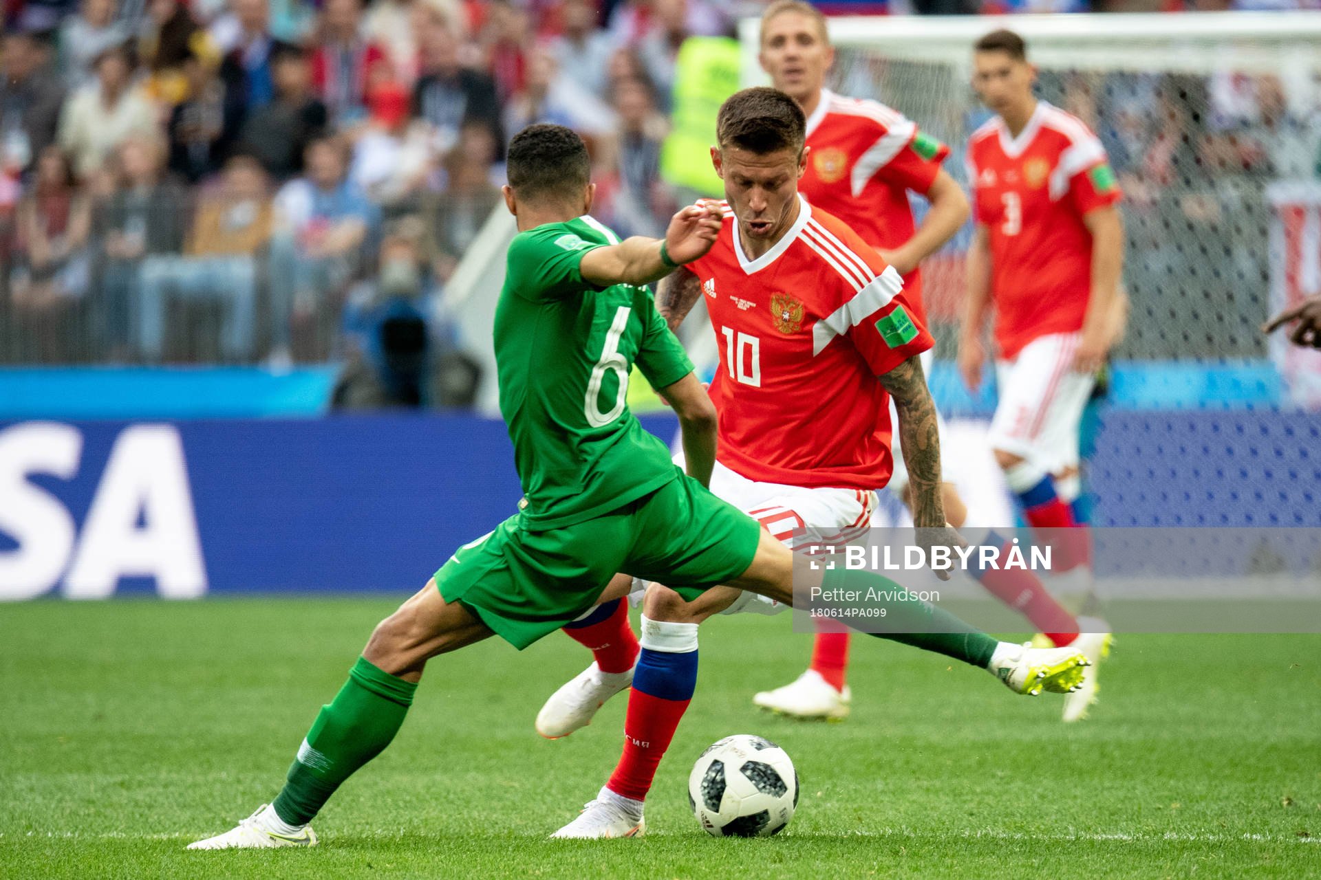 Fedor Smolov of Russia and Mohammed Alburayk of Saudiarabia