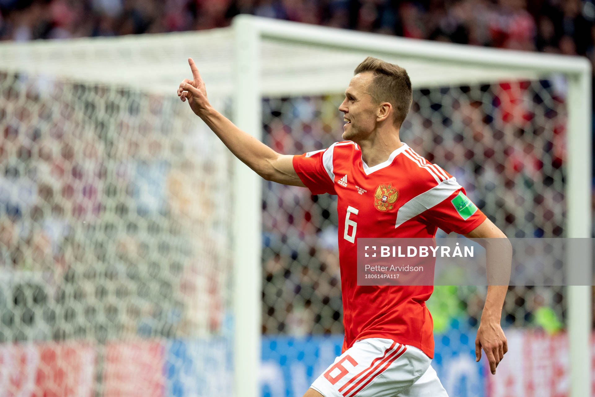 Denis Cheryshev of Russia celebrates after scoring 4-0 during the FIFA World Cup group stage match between Russia and Saudi Arabia on June 14, 2018 in Moscow.