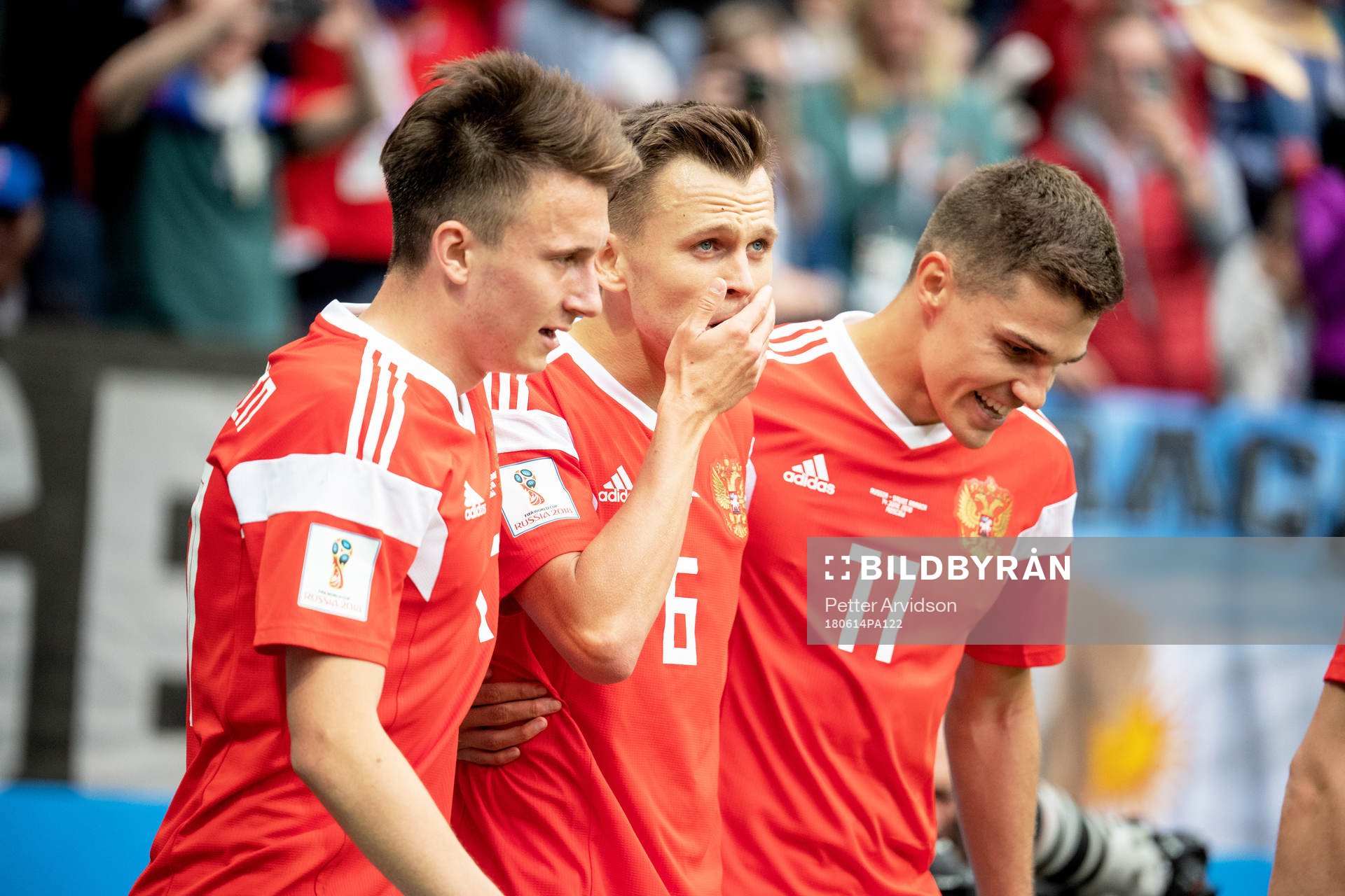 Denis Cheryshev of Russia celebrates with his teammates