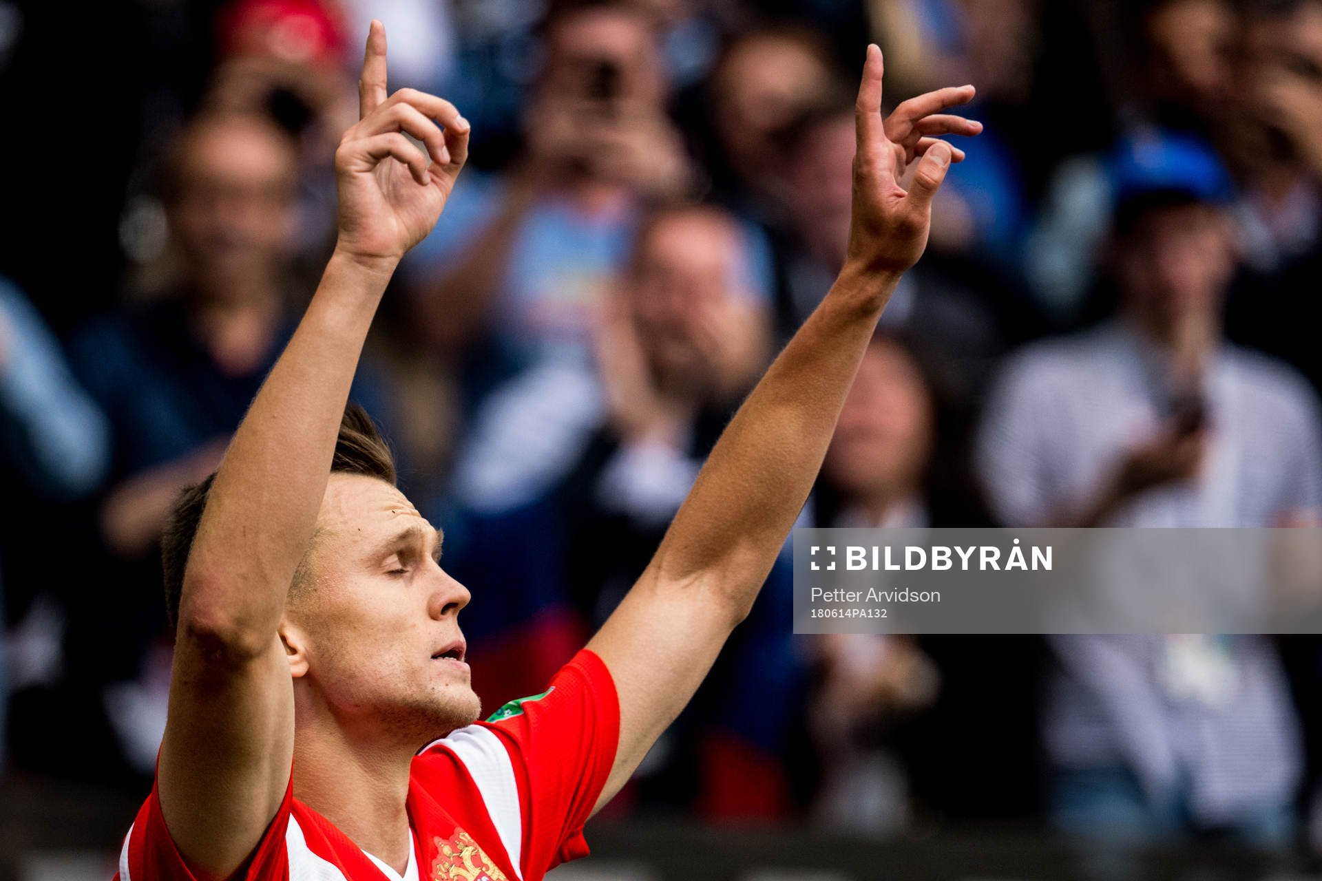 Denis Cheryshev of Russia celebrates