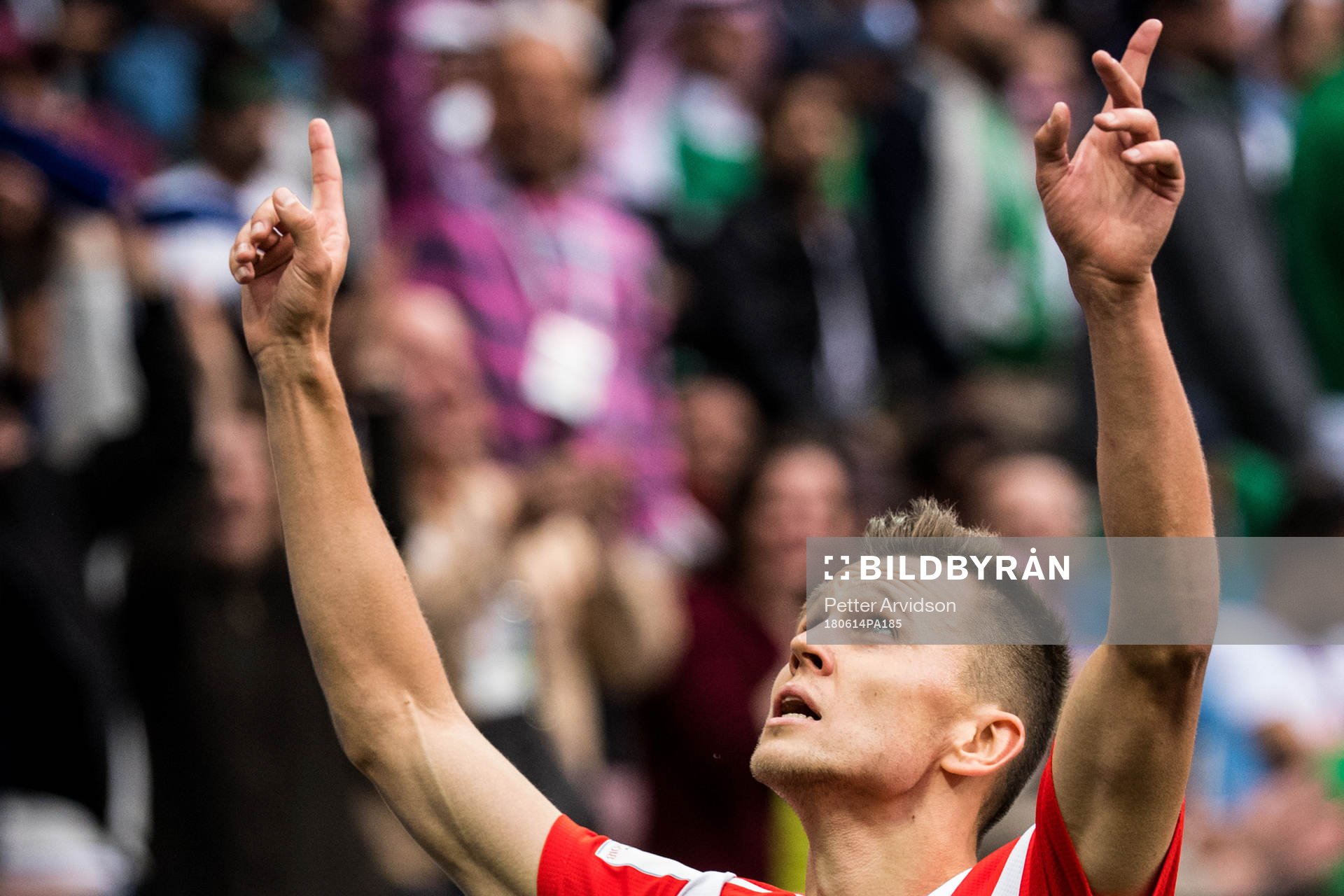 Denis Cheryshev of Russia celebrates