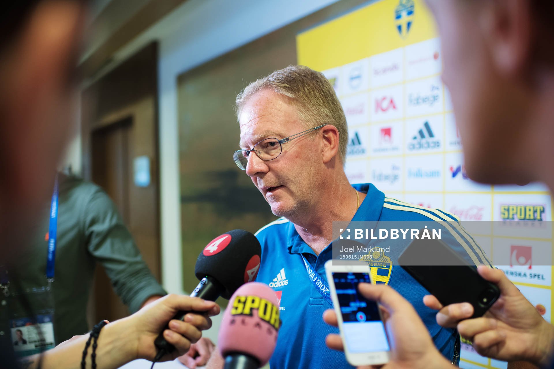 Lars Jacobsson is being interviewed by media at a press