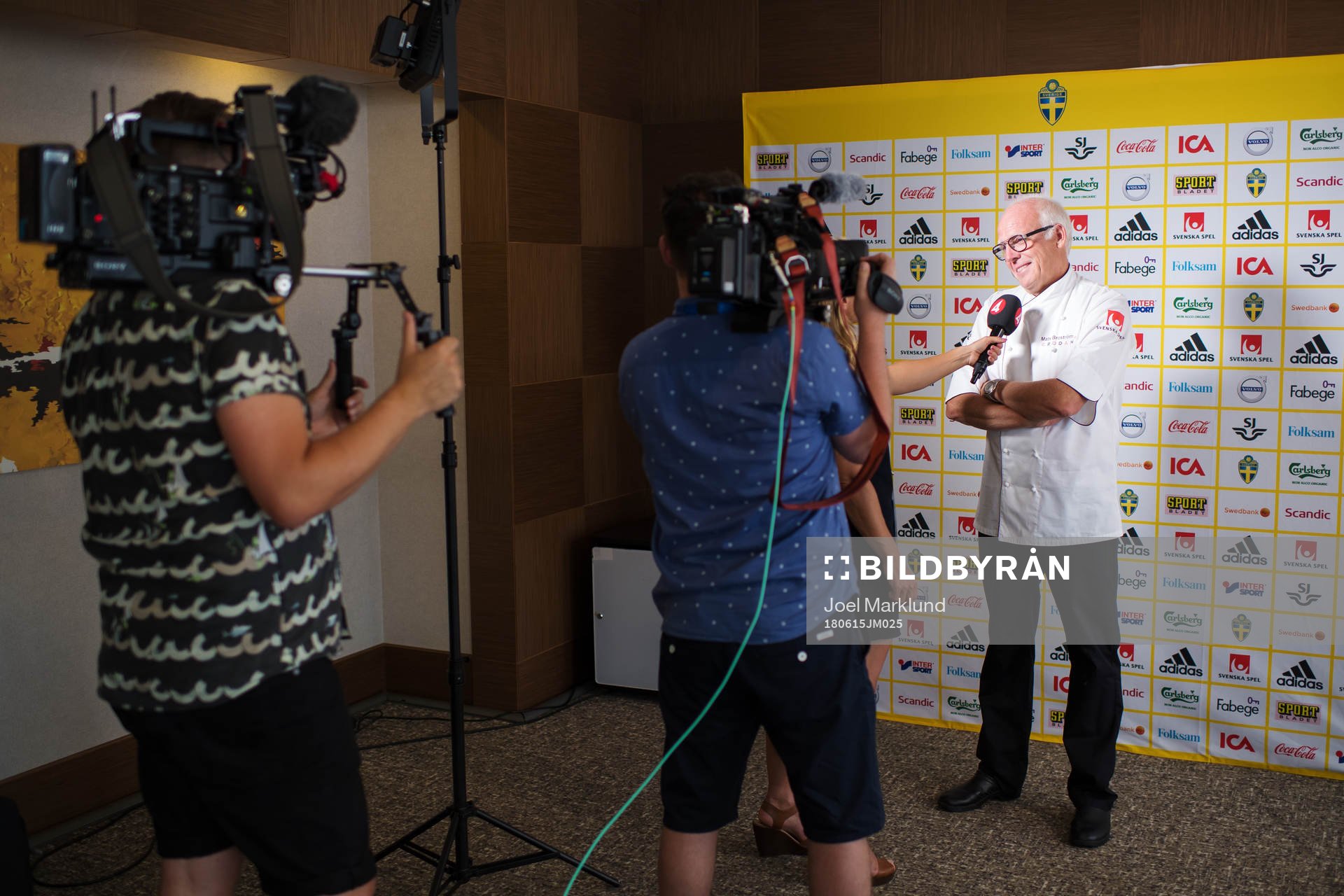 Chef Mats Broström is being interviewed by media at a
