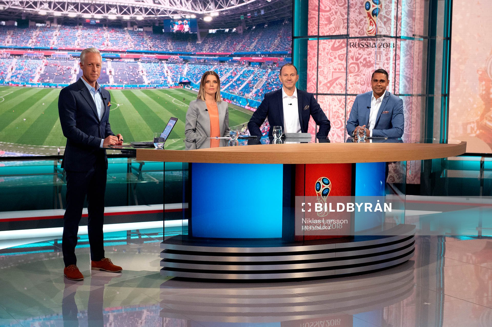 SVTs programledare André Pops, Johanna Frändén, Jonas Eriksson och Daniel Nannskog i studion under fotbolls-VM den 15 juni 2018 i Stockholm.