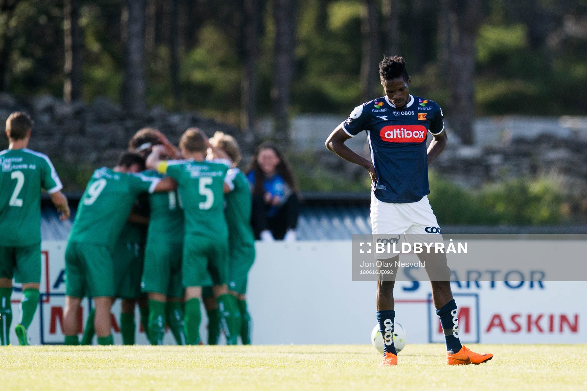 Usman Sale of Viking looks dejected while the players of