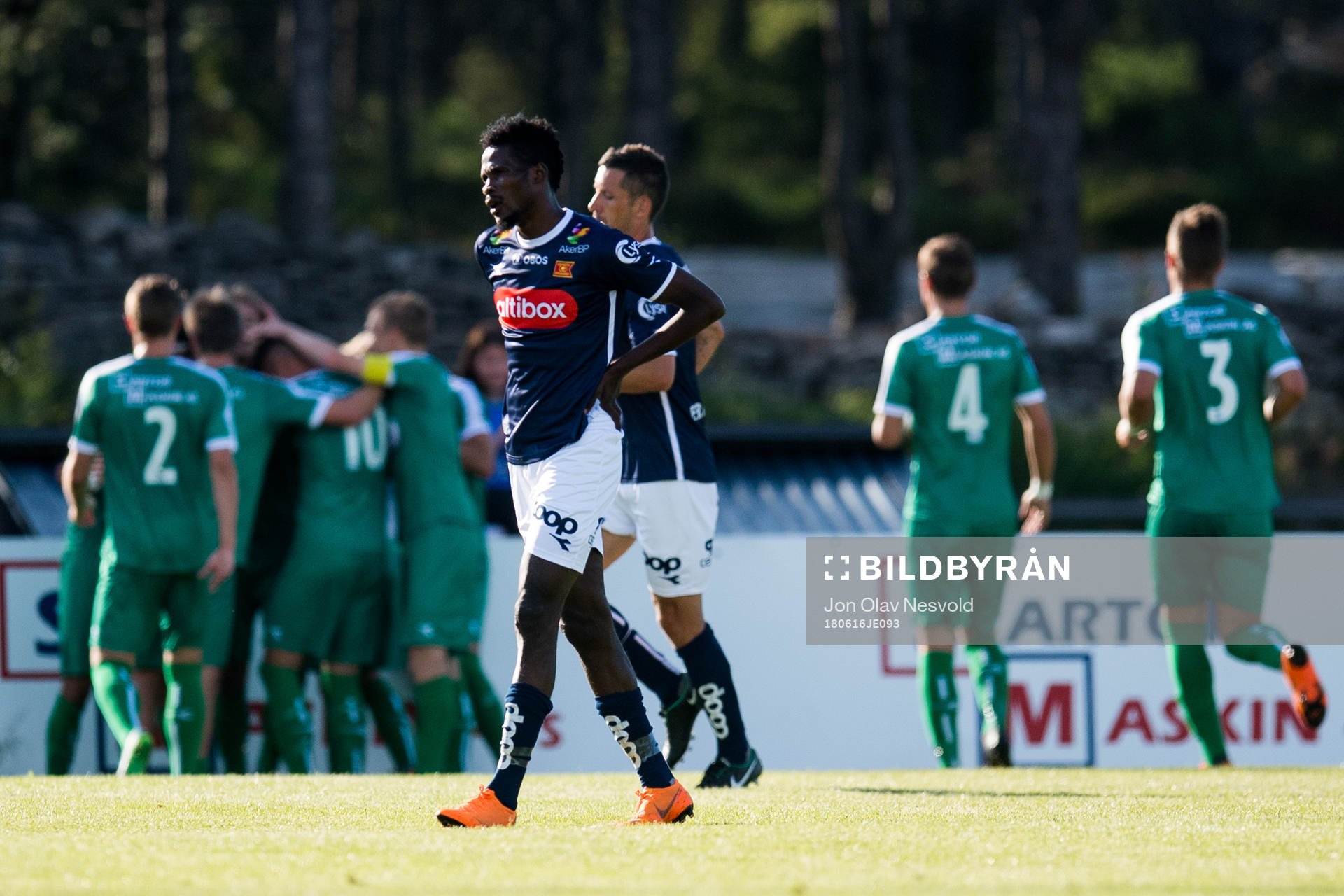 Usman Sale of Viking looks dejected while the players of