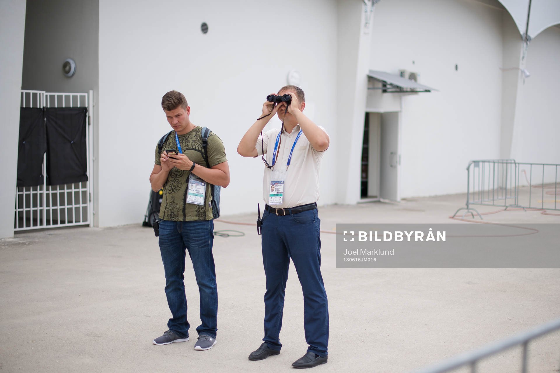 Security agents look for unauthorised spectators when the