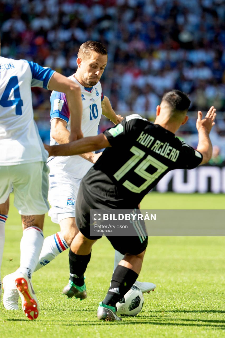 Kari Arnason and Gylfi Sigurdsson of Iceland and Sergio