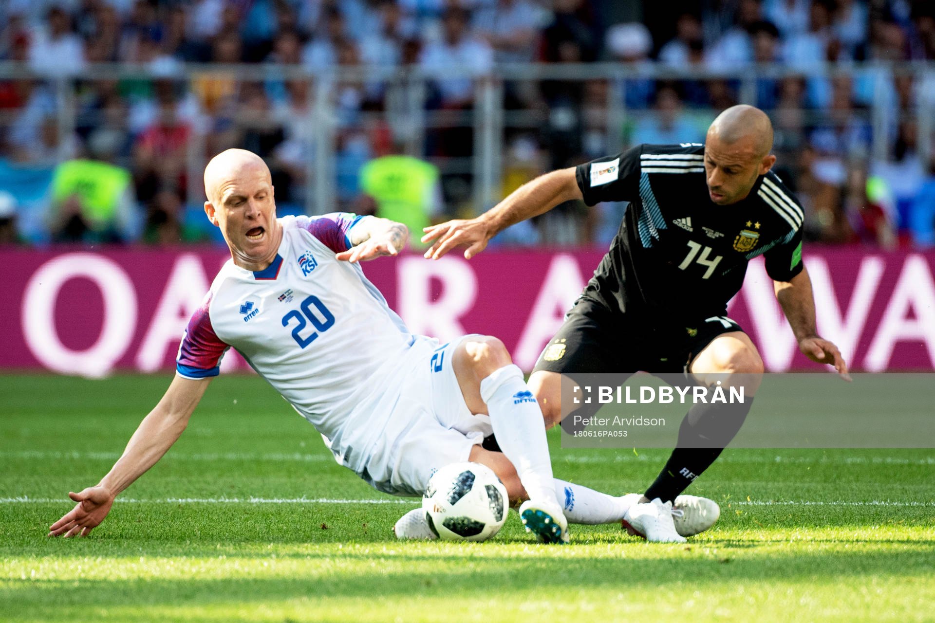 Emil Hallfredsson of Iceland and Javier Mascherano of