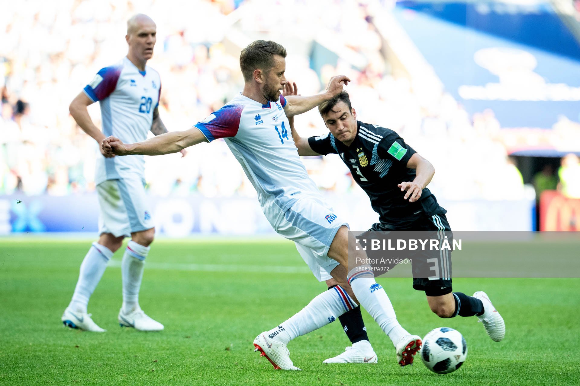 Kari Arnason of Iceland and Nicolas Tagliafico of Argentina