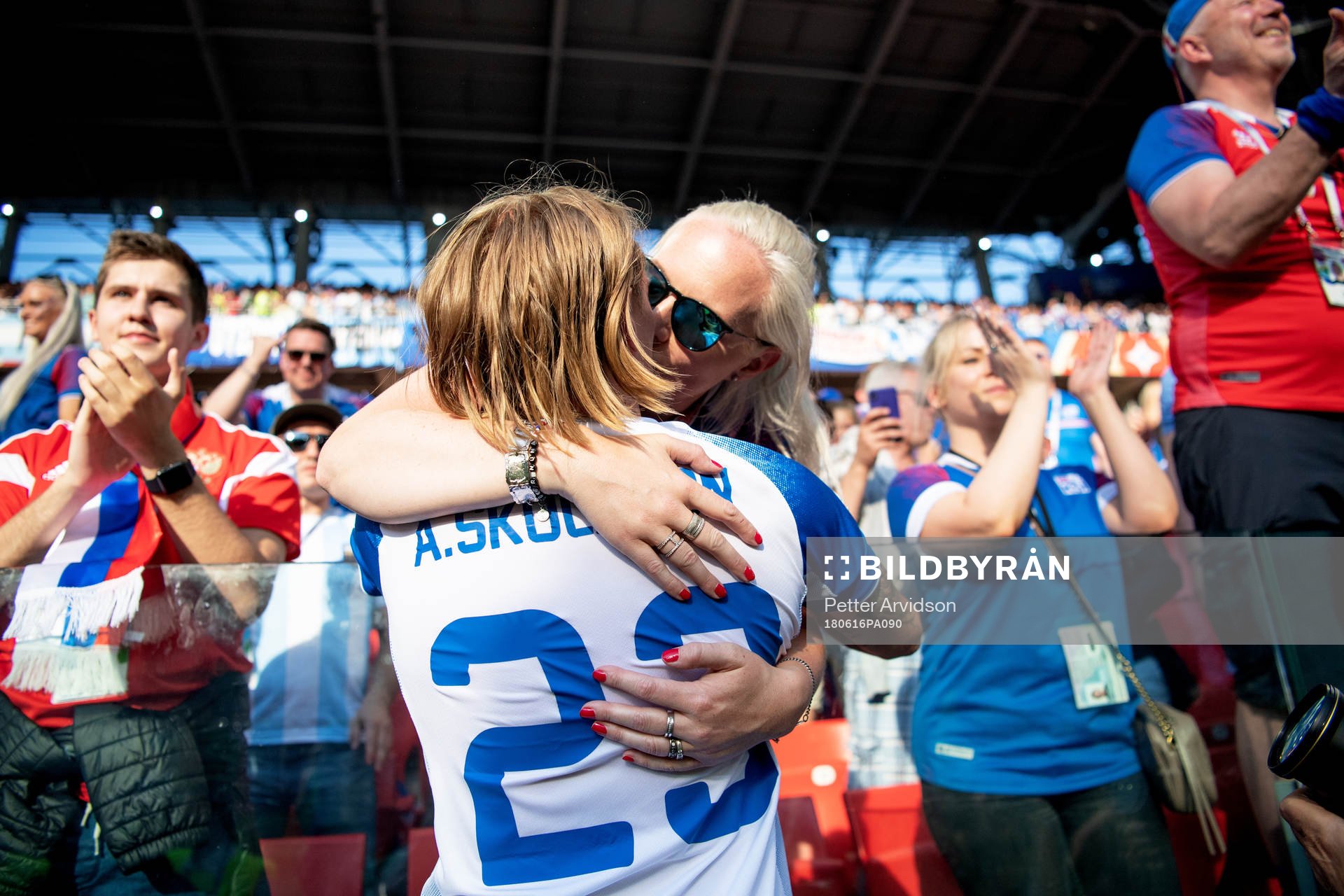 Ari Skulason of Iceland celebrates with his girlfriend