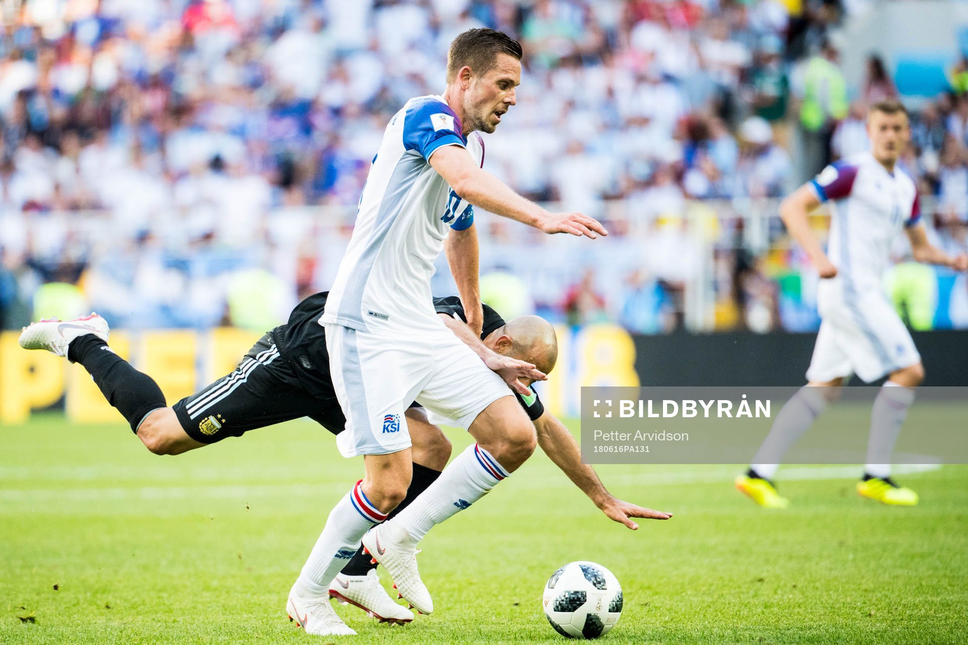 Gylfi Sigurdsson of Iceland in action with Javier Mascherano of Argentina during the FIFA World Cup group stage match between Argentina and Iceland on June 16, 2018 in Moscow.