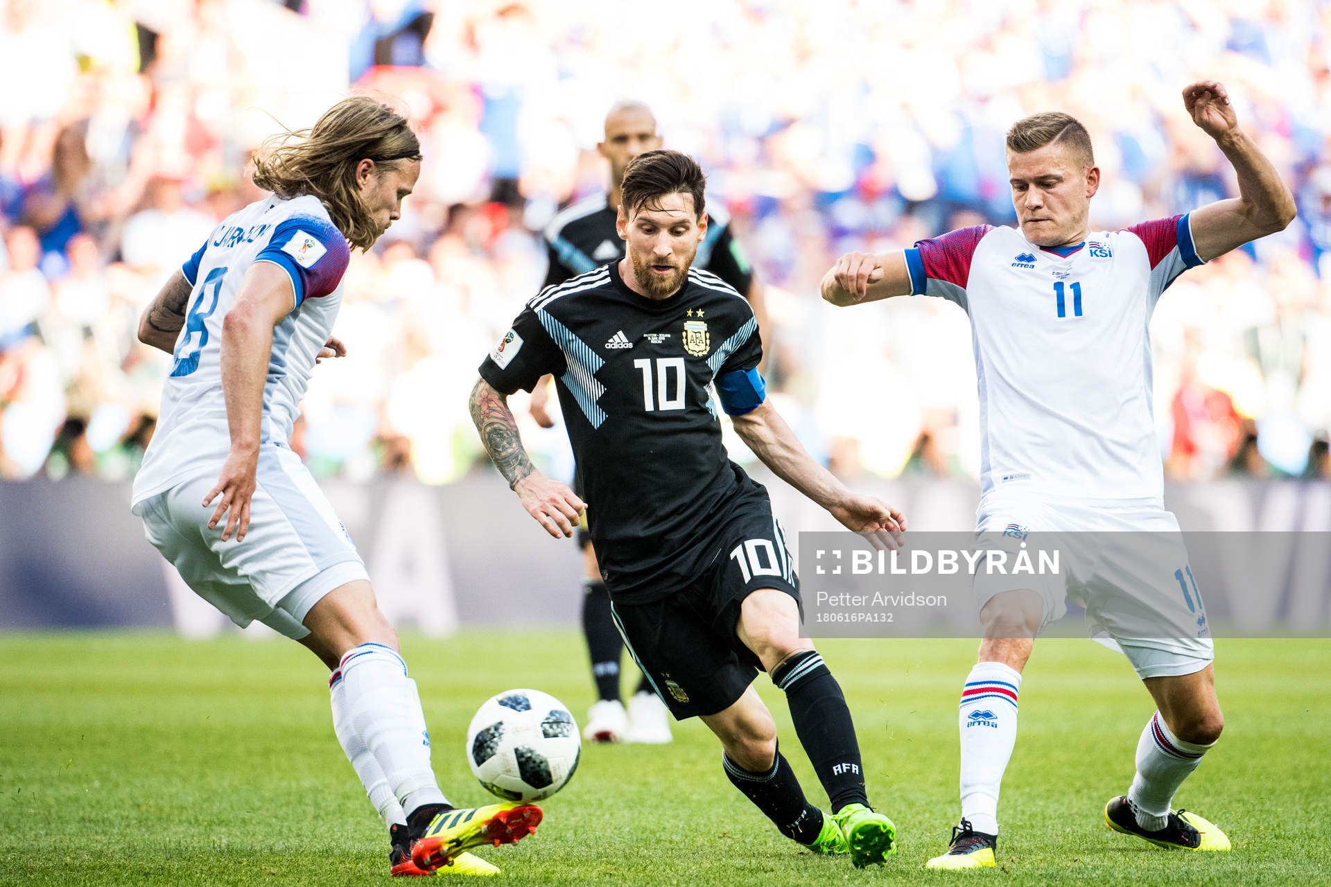 Lionel Messi of Argentina against Birkir Bjarnason and