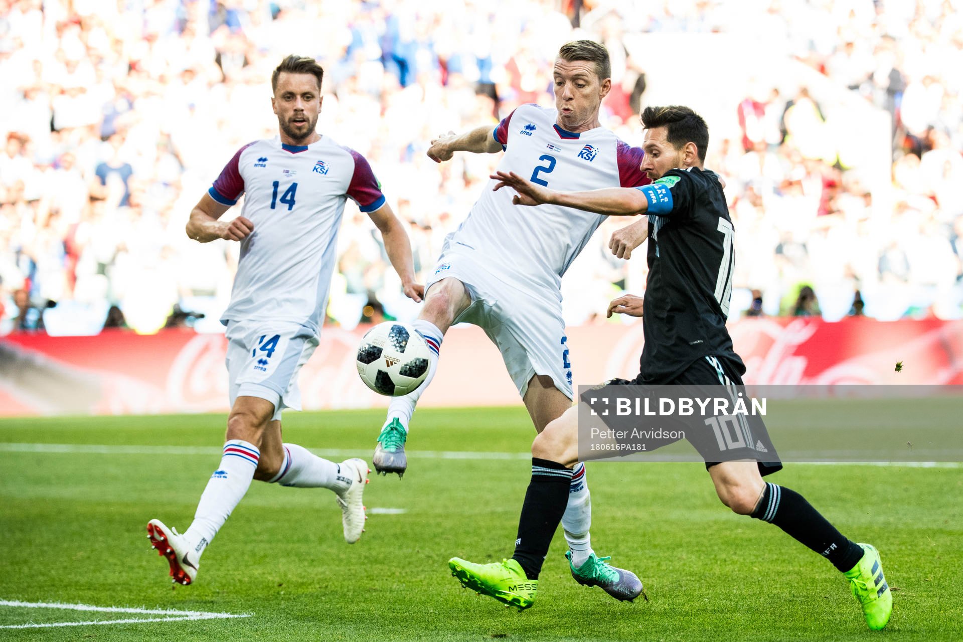 Lionel Messi of Argentina against Kari Arnason and Birkir