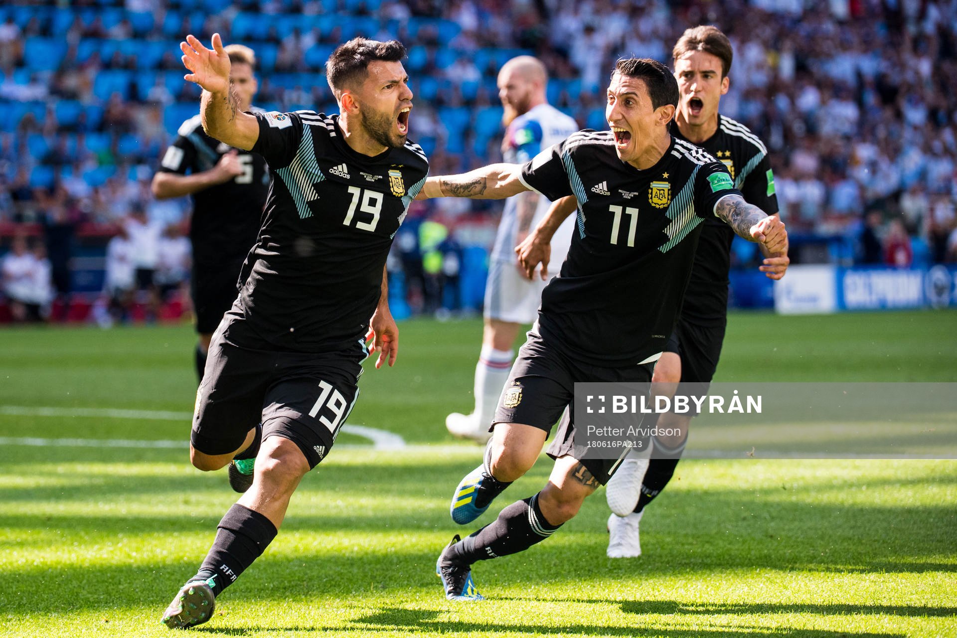 Sergio Aguero and Angel Di Maria of Argentina celebrates