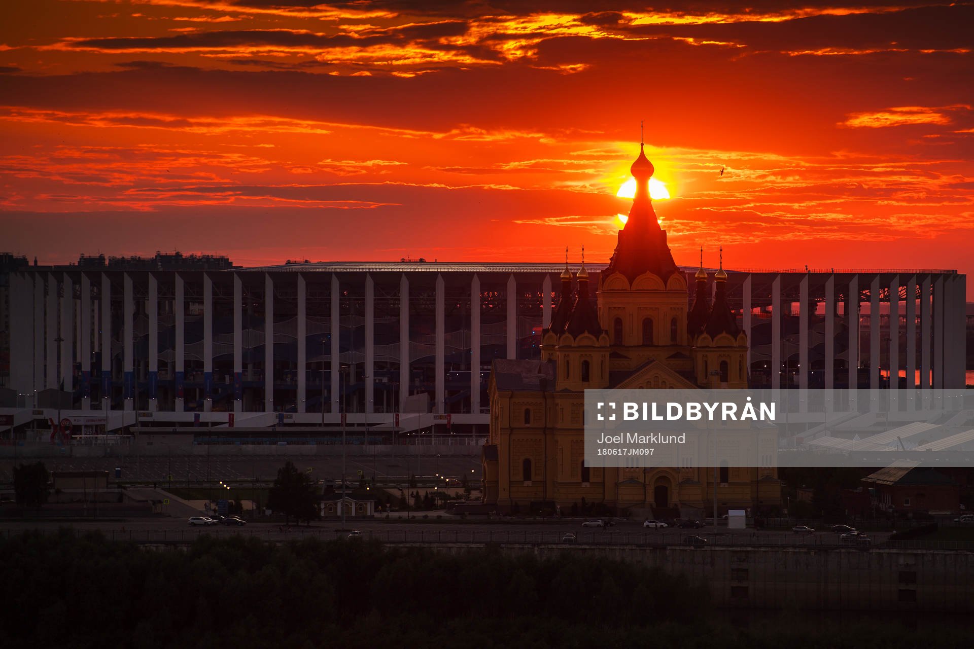 Exterior view of Nizhny Novgorod Stadium and Alexander Nevsky Cathedral at sunset during the FIFA World Cup on June 17, 2018 in Nizhny Novgorod.